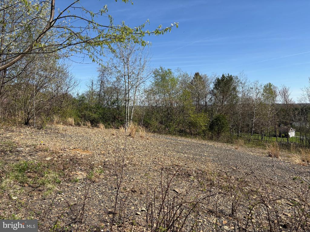Located on Earth Road, ST Marys, PA 15857. This vacant corner lot is 1 acre 200' X 208' city water available and natural gas.