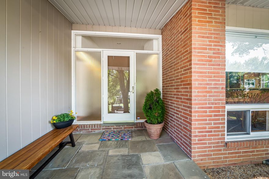 Step back into 1957—when design was daring, entertaining was an art, and homes like this were built to wow. Perched high on “Pill Hill,” this Mid-Century Modern stunner is one of just five originals and still shines with all the details we love: a cool slate entry, a floating teak buffet, custom built-ins, and a dramatic stacked-stone fireplace now updated with gas.

The kitchen is a host’s dream—custom cabinetry matched to the original woodwork, plus a clever moveable island that tucks away or rolls out when the party heats up. The dining room’s picture window serves up nightly sunsets along with wooded views you’ll never want to cover with curtains.

Four bedrooms on the main level—including a primary suite with ensuite bath—make this as functional as it is fabulous. Add in a four-season room for year-round indoor-outdoor living, and a walk-out lower level with wall-to-wall glass, a wine storage room, two-car garage with EV charging, and bonus flex space, and you’ve got the perfect mix of vintage soul and modern convenience.

This is more than a house—it’s a statement. Sleek, stylish, and ready for its next chapter.