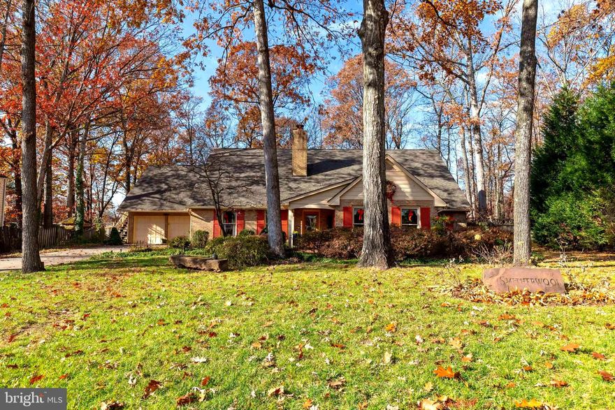 One of the best homes on a quiet street in the sought out community of Owens Wood.   A beautifully manicured home with gardens, located within moments to the VRE, great restaurants, shopping and fun activities in  historical Olde Town Manassas.  This wonderful home has 4  bedrooms, 3.5 baths with a main floor primary bedroom suite.  The primary bathroom has a spa like soaking tub and separate shower, new flooring, freshly painted  and lots of closet space.  This house has many unique features including the travertine marble flooring, arched entrances, open floor plan and woodburning fire place with  a unique custom mantle.  Kitchen has double sinks , garden window,  granite countertops, SS appliances, double oven, pantry and an adjoining open dining area.  There is also an elegant dining room just off the kitchen. Walk out the sliding glass doors to the expansive field stone patio, and an additional covered patio. The home is surrounded by well established trees and shrubs in a natural setting.  A private entrance is accessible from the side of the home that leads  you to the 4th bedroom,  guest suite,  or private office.  NO HOA! Hurry and come see this lovely home; it will not last long! * Agent is related to Sellers*