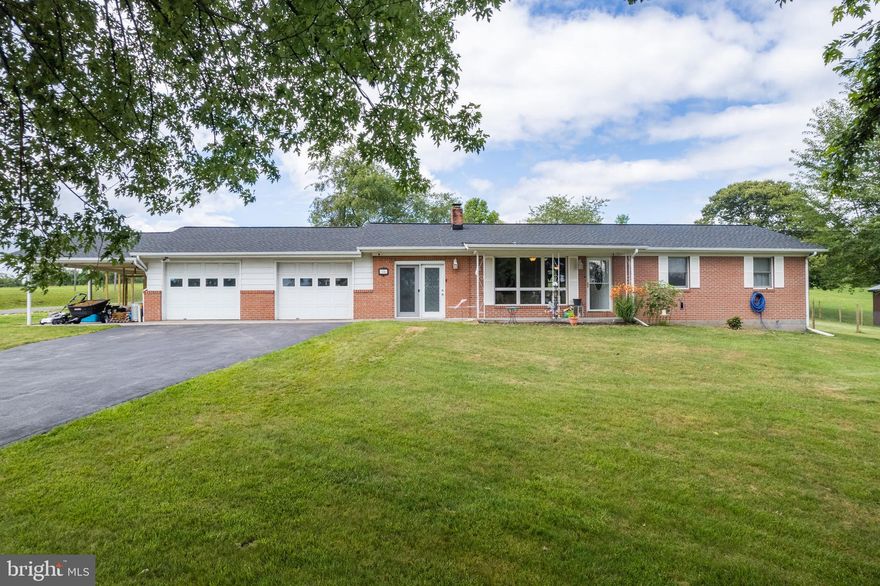 What a great find in a fantastic location !  Single-level 3 bedroom, 1.5 bath brick rancher  w/ over 1400 sq ft of living space on the mail floor , over 1000 sq ft basement w/ 2 additional rooms, 676 attached two-car garage, 364 sq ft carport and fenced backyard all situated nicely on a large corner lot in Old Sunrise! Kitchen was fully remodeled in 2017 w/ all new cabinetry , counters and appliances and hallway bathroom has new flooring and fixtures . Basement also features extensive upgrades w/ new flooring . This is a very nice home in a superior location blocks from grocery stores, banks, dining  and only minutes from the county seat Ronmey ,WV so see this one first and you'll be glad you did !