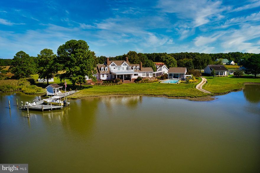 This one of a kind property has it all-145 acres of farmland, pastures and farmland in sought after Royal Oak with a long view of Fox Hole Creek leading to the Tred Avon River. The stately paved driveway passes through the verdant landscape of broad vistas to three ponds, fields, pastures defined by white fences and a canopy of mature sawtooth oaks, until the Colonial style main house is revealed. From the house’s two and a half story main wing, side wings telescope down to one-story wings. The main floor has great indoor-outdoor flow from the waterside rooms of the sunroom, breakfast room, living room, family room and primary suite to the brick terrace that spans the full length of the house. The stair hall on the second floor leads to a spacious deck for bird’s views of the water between the two bedroom en -suites and two offices. The third floor contains another bedroom en-suite.

The property also includes a  2 bedroom suite guest house , detached garage with an apartment above, in-ground pool, pool house with a sauna,, bath, kitchenette and porch, small boat house and pier, and a greenhouse with a sitting area . For the equestrian enthusiast, there is a five stall barn with tack room and washroom with fenced paddocks. Another large barn has been transformed into a garage housing a classic car collection. The variety of outdoor rooms range from the main house’s front porch, rear covered brick terrace, a covered brick walkway that connects the house to the pool area and the pool house’s porch and lounging area shaded by a pergola. This peaceful and very private waterfront haven is both close to the Belleview Ferry to Oxford and is also equidistant to the amenities of Easton and St. Michaels ! 50 miles from Annapolis MD, 70 from Washington DC, 12 miles to the  Easton Airport.

The property is immaculate maintained, new main house  composite roof , geothermal HVAC,   wine cellar, gorgeous heart pine floors, sprinkler system, Starlink internet, broadband cable available , high speed Easton Velosity is also available for hook up.There is a gated main entrance and a farm entrance.

SUBDIVISION POTENTIAL !