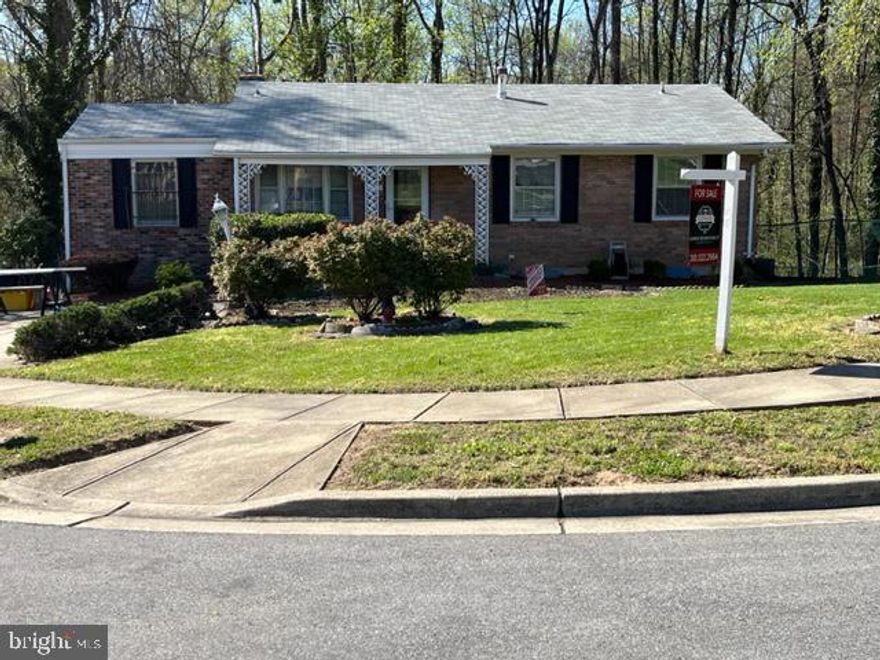 Welcome to possibly your next home. Off street driveway parking. Three bedroom, one full and half bathroom brick front rambler sets on 0.23-acre corner level fenced lot. Recently painted throughout. Three bedrooms on 1st level. Eat-in kitchen, dining room has walk-out patio deck to the backyard. Spacious living room. Full bathroom with walk-in shower, ceramic tile flooring. Family room has wood burning brick fireplace. Walkout to backyard through patio doors. Recreation room, half bathroom, laundry room with washer/dryer. Ceiling fans, central A/C.
Close to community recreation pool and parks, transportation-subway stations, bus routes, and the beltway.  
Property is being sold as is.