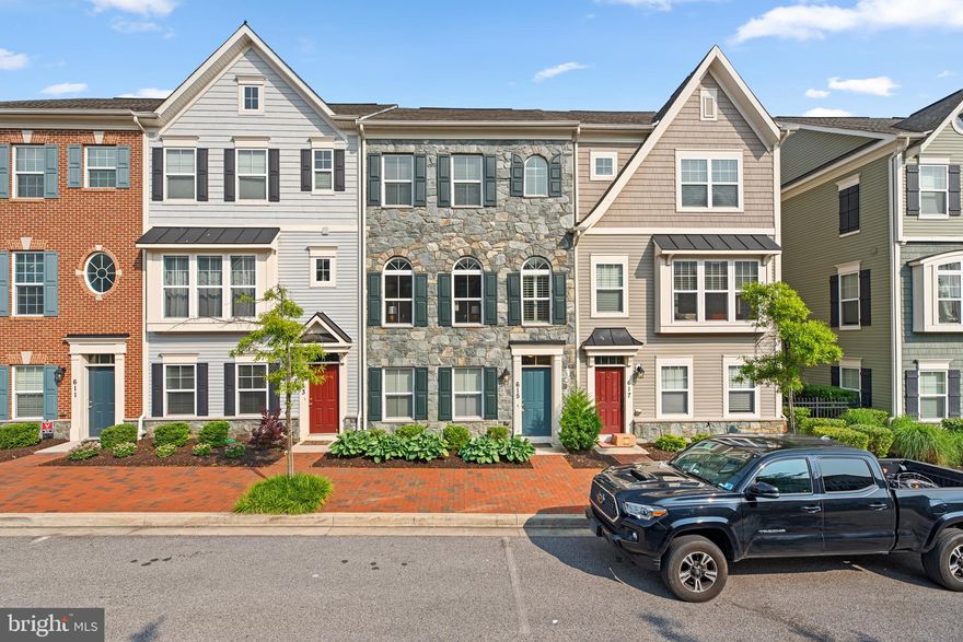 Welcome to the epitome of modern townhome living! This stunning three-level gem is a true embodiment of contemporary design, boasting three bedrooms, two full baths, and a captivating layout that will leave you breathless. Upon entering, you'll be greeted by a warm and inviting living room, setting the tone for the luxurious experience that awaits you. The cleverly designed floor plan effortlessly guides you to the main level, where the heart of the home unfolds before your eyes. Prepare to be captivated by the seamless fusion of the kitchen, living room, and dining room, creating an expansive and open space that is perfect for both entertaining and everyday living.  The kitchen is a true masterpiece, featuring sleek maple cabinets that exude elegance and ample storage space for all your culinary needs. The dazzling granite countertops add a touch of sophistication, serving as both a functional workspace and a beautiful focal point. Whether you're hosting a lavish dinner party or enjoying a quiet meal with loved ones, this culinary haven will surely inspire your inner chef.  As you ascend to the upper levels, you'll discover the private retreats that await you. The three well-appointed bedrooms provide ample space and comfort, ensuring peaceful nights and restful slumbers. The two full baths offer a serene oasis where you can indulge in relaxation and tranquility after a long day.  This townhome's three-level design offers the perfect balance between privacy and togetherness, allowing you to retreat to your personal sanctuary whenever desired while also enjoying the communal areas that foster a sense of connection.  In addition to its stunning interior, this townhome is freshly painted from top to bottom and all new carpets installed.  It is ideally located near many parks and recreation areas as well as shopping and dining options, everything you need is just moments away, making this the ideal location for those seeking convenience without compromising on luxury and all within minutes to Downtown Annapolis.  Don't miss the opportunity to make this exceptional townhome yours.