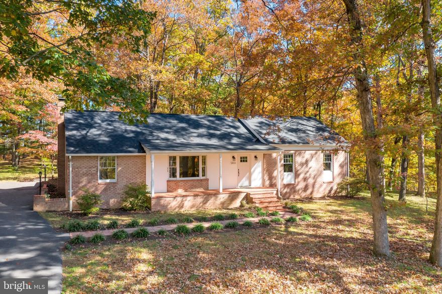 This spotless 4 bed, 2 bath rancher sits on approximately 6 acres of unrestricted, wooded land. Location is amazing, just minutes from shopping in Winchester, but with enough space and distance to give you the feeling of being on your own wooded country retreat. The newly updated kitchen features stainless appliances, a butcher block island, and casement windows over the single bowl sink. Best of all, lots of light coming in through the skylights in the kitchen and dining room! Enjoy the wooded views from the big, beautiful bay window in the living room. In the basement, you'll find a wood stove and a large laundry room complete with an industrial wash sink. Roof, HVAC, and hot water heater are all less than five years old. Fantastic value--you won't find another home of this quality on this much land! Come see your next home today.