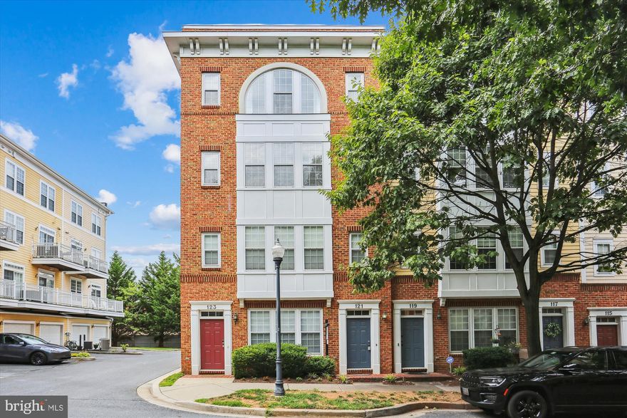 NEW FLOORING AND QUARTZ KITCHEN COUNTERTOPS HAS BEEN ADDED. ONE OF THE LARGEST AND  LOWEST PRICE PER SQUARE FOOTAGE IN KENTLANDS***** his luxurious and comfortable end unit condo/townhome epitomizes upscale living. It features 3 bedrooms and 2.5 bathrooms, with plenty of natural light that creates a warm and inviting ambiance. Boasting over 2900+ square footage, it is one of the largest townhomes in Kentlands. The living room and dining room showcase elegant crown molding and a cozy gas fireplace, ideal for gatherings and unwinding. The Owner's Suite is generously sized, offering a spacious walk-in closet, an additional closet, and a private bathroom with a double vanity, soaking tub, and separate shower with a glass enclosure. Two more well-proportioned bedrooms come with ample closet storage. Convenience is assured with a dedicated laundry room and a 1-car garage. Furthermore, the home includes a private balcony, providing a perfect space for relaxation. Situated close to downtown Kentlands, you'll have easy access to restaurants, shops, and movies, offering a perfect blend of modern living and urban convenience.