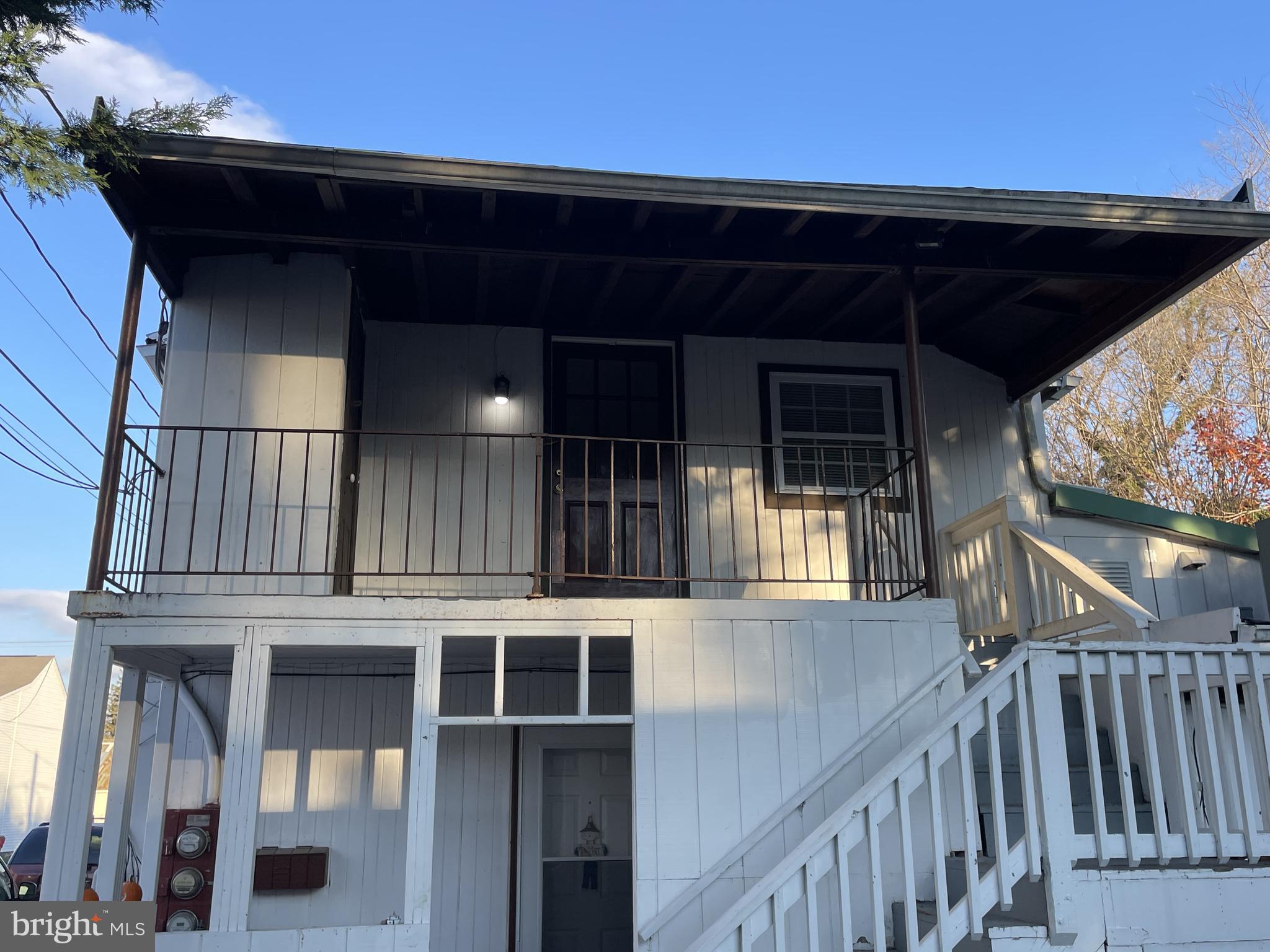 Welcome home to this great upper level apartment in downtown Charles Town. This spacious 2 bedroom 1 bath apartment with full kitchen, and full size in unit washer and dryer, boasts wood floors and high ceilings. The central AC keeps cool in the summer and programmable heat warm in the winter. Enjoy the outdoors with a covered and semi-enclosed patio that looks onto a grassy lawn common area and privacy trees and fence. The downtown location means easy access to all downtown Charles Town has to offer. Minutes to major commuting routes, 340 & 9, as well as Walmart, Charles Town Casino and Races, Martins, Food Lion, Marshalls to name a few.