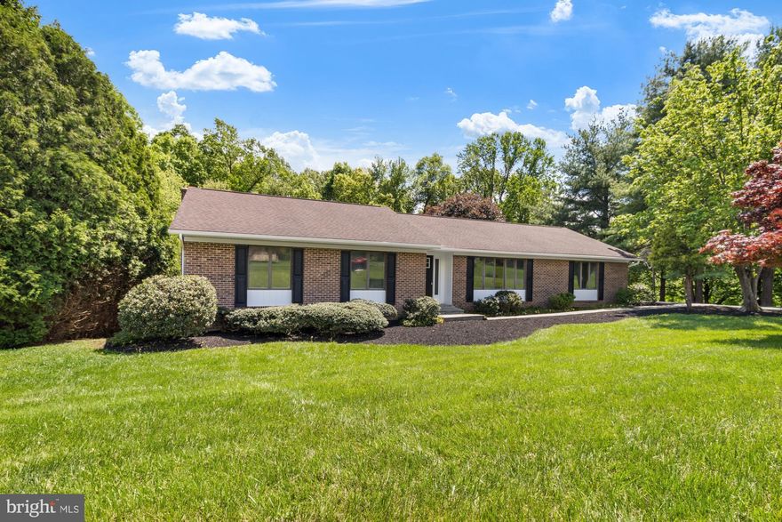 Welcome to this fully renovated rancher nestled on a beautifully landscaped 1-acre lot in one of Fallston’s most desirable neighborhoods – Quiet Inheritance. This spectacular home blends modern finishes with classic charm and offers exceptional space inside and out.

Step into the bright open kitchen featuring white shaker cabinets, quartz countertops, a large island, stainless steel appliances, and patio doors that lead to a brand new composite deck—perfect for summer gatherings and morning coffee. The kitchen opens seamlessly to a cozy family room, while a spacious front living room provides even more room to relax or entertain.

With 4 generously sized bedrooms and 2 fully updated baths, there’s space for everyone. The finished lower level is a showstopper—complete with a massive rec room, a wood-burning fireplace, and a private bedroom suite featuring an en suite bath with a walk-in shower and two walk-in closets.

One of the highlights? A huge 3-season room off the walk-out lower level—ideal for picking crabs, cheering on the Ravens and Orioles, or simply enjoying peaceful views of your private backyard oasis.

Don’t miss this incredible opportunity to own a move-in-ready gem in Fallston’s Quiet Inheritance—a rare find that truly has it all!