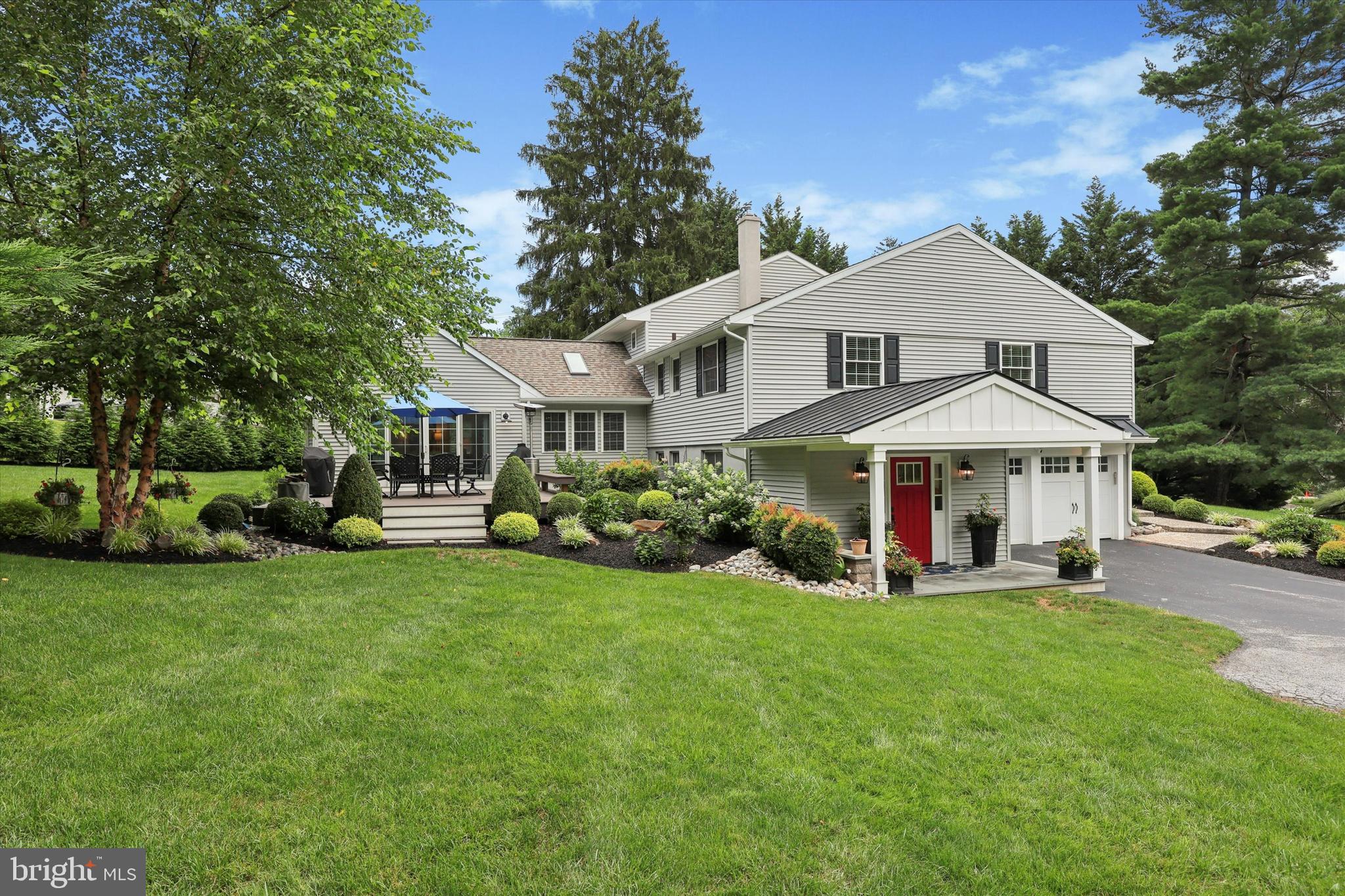 Welcome home to 280 Deepdale Rd, a 4 bedroom, 3.5 bath Tredyffrin home reimagined by Period Architecture creating better flow and function and low maintenance living. Gorgeous landscaping of flowering shrubs, mature trees and a stone walkway provide the exquisite curb appeal inviting you inside the home. Through the front door is the light-filled living room, flanked by large picture windows and decorative stone fireplace - fit for greeting guests and private conversations. The lower level is the 2 car garage and mudroom plus powder room and bonus space to use as a kids playroom or homework room. Just beyond the main floor is the expanded, renovated space encompassing the white Chef’s Kitchen, Dining area, and Great Room where entertaining is made easy. The gourmet kitchen features a convenient pot filler, gorgeous stone and quartz counters, full overlaid European cabinets and dovetailed drawers, a new Dishwasher, and gas cooking. Large windows, skylights, and high cathedral ceiling brighten the Great Room where access to the patio create easy inside/outside flow. Spend your quiet evenings on the Trex deck and watch your kids kick the soccer ball around in the backyard. The second floor has an ensuite bedroom (formerly known as the original primary) and 2 extra bedrooms with plenty of closet storage and the Hall bath. The third floor is the new Primary Suite, adjacent to the most convenient Laundry Room. High volume ceilings with a sizable walk in closet and the Bathroom with its Glass shower, Soaking tub, Double Vanity provide the perfect Sanctuary. Additional improvements include Engineered Hardwood flooring, new Windows in 90% of the house, Exterior Paint, new HVAC, and new Dishwasher. The Deepdale neighborhood is centrally located near Downtown Wayne, Strafford and Wayne train stations, Award winning Tredyffrin-Easttown schools, major transportation routes. This home is perfect and turnkey for the next suburban family.