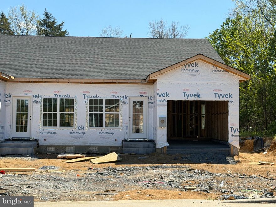 Brand new construction in a newly built quadplex located in the heart of Woodstock, VA, just minutes from the natural beauty and outdoor recreation at Seven Bends State Park—where miles of hiking and biking trails, river access, and scenic vistas await. This thoughtfully designed 3 bedroom, 2 bath unit offers comfortable one-level living with an attached one-car garage. The open floor plan provides a seamless flow between the living, dining, and kitchen areas, ideal for everyday living and entertaining. Spacious bedrooms, modern finishes, and quality craftsmanship throughout make this a great opportunity to own new construction in a convenient location. Real estate taxes currently shown do not reflect a home built on the property.