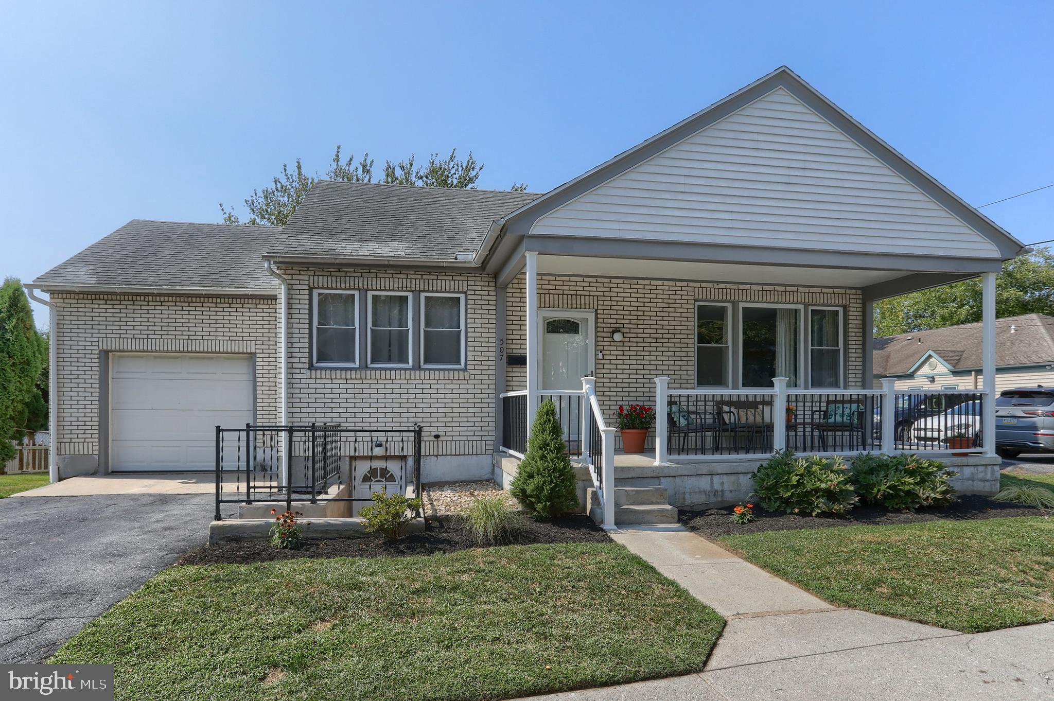 Clean and pristine. Sturdy cape cod on the south side of Lebanon City. This home has been carefully maintained and thoughtfully renovated; and is now ready for its next chapter of ownership. The main level has a convenient first-floor bedroom and full bathroom. Two (2) additional bedrooms and one (1) full bathroom upstairs. Both bathrooms have been remodeled. The comfortable layout provides a large living room with a wood pellet stove and custom fireplace with a live-edge mantel. The large porch provides a cozy space to entertain or to enjoy a morning coffee. The back yard has been improved with a 6-foot wooden fence to maximize privacy. Perfect for children or dogs. The oversized one-car garage runs deep and also has a large storage area above that is accessible by staircase. All windows have been replaced. Roof installed in 2010, and still in great shape. Other recent upgrades include all new flooring, carpet, and paint (2023 to 2025), all light fixtures replaced (2025), Upgrades to fireplace venting and motor (2024), Concrete improvement to exterior basement steps, Exterior soffits, fascia, trim painted (2024), Most baseboards replaced (2025). Close proximity to grocery stores, restaurants, shops, and all local schools and hospitals. This home is solid and can be purchased with confidence. Seize your moment!