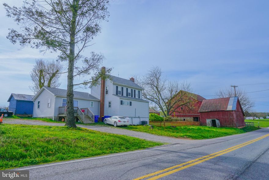 Beautiful 8-acre property offering a perfect blend of open land and wooded privacy. Approximately 5 acres are tillable or suitable for pasture, with an additional 2 acres of woods. The property features a large barn with stalls, as well as a pole barn with a 2-bay garage and electricity—ideal for hobby farming, livestock, or storage.

The 1,721 SF home includes 3 bedrooms and 2 full baths, with both a full kitchen and a kitchenette. The layout is well-suited for in-law quarters on the first floor, providing flexible living arrangements. A small fenced yard and separately fenced pasture complete this versatile property.