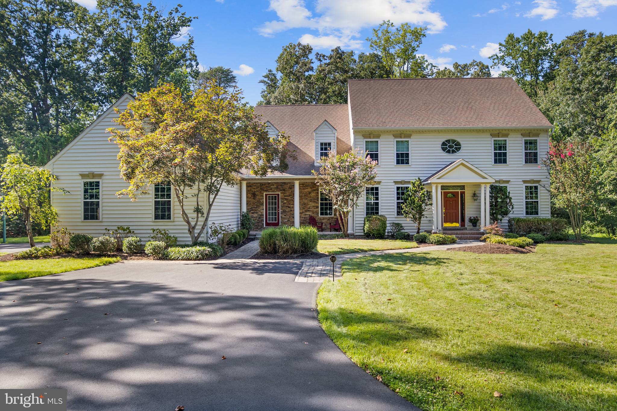 Welcome to 210 Canterwood Court, located in the beautiful community of Old Mill Bottom Estates.
Privately situated on 9.71 wooded acres, it is a perfect place for children to enjoy the outdoors, build
forts, and explore nature. From the side porch, you’ll feel as though you’re in the middle of a
park, surrounded by trees and wildlife. And while this home enjoys all the benefits of the community, it
is not subject to HOA fees, a rare and desirable feature.
Inside, the gracious foyer opens to the inviting family room, flanked by a formal dining room to the left
and a formal living room to the right. Natural light fills the family room, where a wood-burning fireplace
creates a warm gathering space. The room lends itself to plenty of family and friend time, whether
enjoying Sunday football or an evening of games. A glass-paneled door leads to a lovely screened-in
porch, the perfect spot for quiet mornings or relaxed evenings without interruption from pesky bugs.
The heart of the home is the newly refreshed kitchen, featuring quartz countertops with soft gray veining, new sinks and faucets and abundant cabinetry. A built-in wine and coffee bar, a new cooktop in the island with seating space for barstools, and room for a large farm table make this kitchen as functional as it is beautiful. The space also opens to the screened porch. Just beyond, you’ll find a walk-in pantry, a private office, and access to the back staircase.
The main level also offers a bedroom with adjoining full bath and french doors to the backyard, ideal for
guests or multigenerational living. Upstairs, the primary suite is a true retreat with a gas fireplace
(currently not hooked up), new lighting and flooring, a built-in coffee bar, an expansive closet, and a
luxurious bath with laundry. Three additional bedrooms complete the upper level: an ensuite guest
room with a new vanity and flooring, and two front-facing bedrooms that share a Jack & Jill bath and get
loads of natural light, with new bathroom flooring and refreshed dual vanity sinks.
Thoughtful updates throughout the home include new lighting, new bathroom faucets, fresh paint,
plantation shutters, and landscaping. The oversized garage boasts high ceilings and a workbench. No
worries about bringing in the outdoors from your adventures in the woods, as there is an outdoor
shower perfect for cleaning off before coming inside.
The unfinished basement, already plumbed for a bathroom, offers endless possibilities for creating a
media room, fitness space, or recreation area tailored to your lifestyle.
Whether gathering in the formal spaces, enjoying quiet evenings on the screened porch, or taking in the
natural beauty that surrounds the property, this warm and welcoming home offers the perfect balance
of comfort, style, and privacy. *The photographer will shoot the house and property today and pictures should be available by tomorrow*