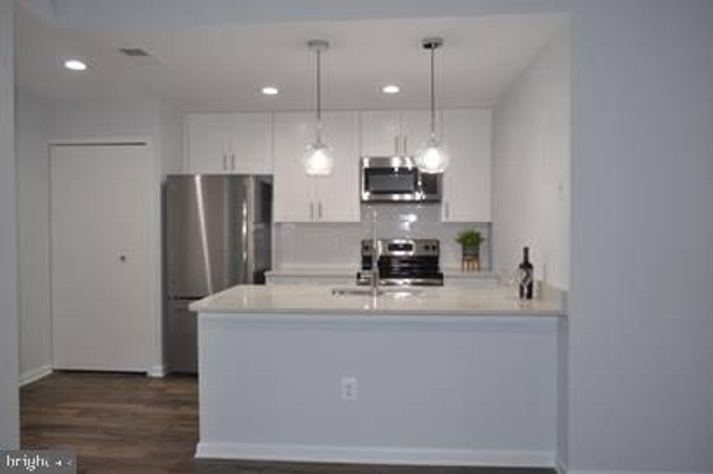 Photo of 8613 - B Beekman Place #13B, ALEXANDRIA, VA 22309 (MLS # VAFX2277032)