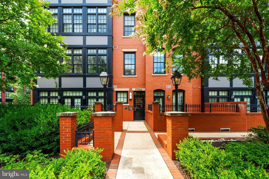 Stunning two story, loft style, penthouse at the highly sought after Gaslight Square located between Rosslyn and Courthouse.  Completely Renovated with NEW FLOORS and THREE parking spaces, home automation systems, 5 flatscreen TVs, top of the line grill with gas line connection ALL INCLUDED. A previous, approximate $500,000 of custom design throughout by multiple local and national award winning design group, ADG, this penthouse is truly unique. Enter through the elevator and walk into the gourmet kitchen complete with a SubZero, Wolf stove, wine fridge, and Miele coffee bar. Continue into the living and dining with expansive 20" ceilings and two story windows equipped with automatic shades. Looking over the formal living is the a loft with custom TV display and wet bar for your more informal needs. Dual primary bedroom capability. Both complete with walk in closets and updated bathrooms - Including TVs in the mirrors. The second floor also includes a large private rooftop patio with outdoor TV and grill.