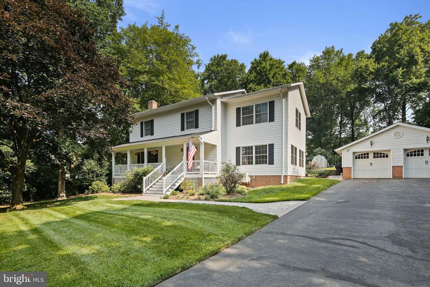 Welcome home to 2924 Greencastle Road, a picturesque colonial boasting two-story addition and offering four bedrooms, two full and two half baths.  Just up your stone walkway, find your sprawling covered front porch, leading to the main level which features hardwood floors, wood burning fireplace, recently renovated kitchen (2023) with new cabinetry, spacious island, stainless steel appliances, granite countertops, and recessed lighting.  Kitchen also hosts an eat-in area, pantry, and access to your back deck.  Just off the kitchen is a bright and airy family room with walkout to rear patio, backyard, and detached garage.  On the upper level you will find your primary suite with updated primary bath, three secondary bedrooms, and recently renovated second full bath.  Fourth bedroom holds laundry closet for upper level laundry convenience.  Lower level equipped with a dry bar and rec room, as well as plenty of storage space.  Backyard is perfect for entertaining with both a deck and patio, and over half an acre of functional, yet private yard space.  Easy access to public parks, library, rec center, ample shopping and restaurants.   Kitchen renovated 2023, second full bath renovated 2023, carpet 2023, roof 2020, full list of updates available.