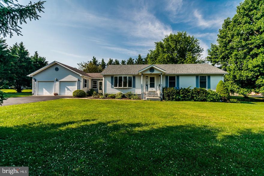 A sweet property in a great location. Level lot with partial fencing in rear. Ideal for pets or play area. Garage workshop area and an awesome breezeway between the house and garage.  You'll enjoy the screened back porch all year long.  New carpet , appliances and fresh paint. Move right in...nothing needed here.  There's room for a garden and all the toys here.