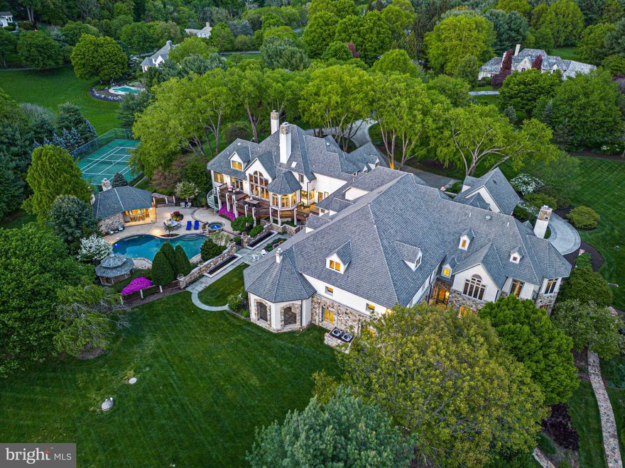 This magnificent estate is a truly one-of-a-kind home, boasting an incredible 25,000 square feet of luxurious space with separated areas for entertaining and private living. Perfectly situated on an 8 acre expansive lot, this property offers unparalleled privacy and seclusion, with breathtaking views of the surrounding landscape.  The option of purchasing the adjacent 4 acre lot is an amazing opportunity to preserve the view or to build.

The home includes a total of 6 bedrooms and 8 full baths, ensuring ample space and privacy for family members and guests alike. In addition, there are 7 half baths conveniently located throughout the home, making it easy to entertain guests or quickly freshen up.  

Upon entering the home you'll be immediately struck by the gorgeous 2 story foyer and that leads into the family room the beautiful property view beyond.  Just off of the foyer is an inviting dining room, with an oversized fireplace adding to the coziness of the room.  The stunning kitchen, recently renovated by Waterbury, has a double Sub Zero refrigerator, a 6 burner Viking Stove and simply breathtaking views from the dining nook.  A second family room is located adjacent to the kitchen and the primary suite is conveniently located just off of the foyer and family room.

Heading to the second floor, you'll find a private ensuite guest room, and three addtional bedrooms,  and two full baths.

When it comes to relaxing at home or entertaining family and friends, this home simply has it all!  As you move through the private living area to you'll find a  second kitchen just off the main kitchen.  A large laundry room with 2 sets of washers/dryers makes daily tasks a breeze.  Further down the hall is a second foyer and his/hers study beyond.  Heading up the stairs from the secoond foyer here is the oversized inlaw suite.  

On the lower level you'll find the standout features of this home: the impressive indoor basketball court, perfect for staying active and practicing your skills, and a gameroom that spills out into the very private pool area. There's also a tennis court for those who prefer outdoor activity. After a long day of play, unwind and relax in the indoor or outdoor hot tub, sauna, or outdoor pool.

Just a few steps from the home lies the greenhouse with separate caretaker suite and media room below.  Just adjacent to this space is a separate 2 car garage with its own access driveway.

The owners have invested in many improvements and updates to the home - see list in documents. 

Overall, this home is a true masterpiece, offering an unparalleled combination of luxury, privacy, and conveniently located to all everything the Brandywine Valley has to offer.