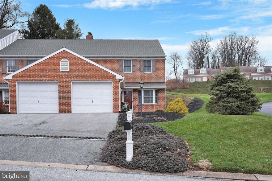 Welcome home to this gorgeous 2-story all brick end unit. Here you will experience 1st floor condo living in a quiet community.  If you're looking for a new home in a friendly neighborhood that provides all exterior maintenance, including lawncare and snow removal, look no further, this private community has got you covered!!!! These highly desired condos are a rarity. They are perfectly located in Dallastown School District just minutes from local shoppes, dining, York Hospital, Apple Hill Medical Center and I-83. These stunning condos are very well maintained with beautiful landscaping-as you will see coming into the development. Care-free living at its best! This beauty boasts 2 very large bedrooms with each their own full bathrooms. The main level will impress you with it's well lit open layout. This end-unit has lots of windows offering tons of natural light!  Just off the garage is an additional room perfect for a study,  currently being used as a 3rd bedroom. Across the hall is the kitchen and nook that welcomes you into the large living room with enough space to create a formal dining area. The main floor also offers the convenience of a powder room. Warm up by the gas fireplace or walk out back to your peaceful patio and enjoy your morning coffee or some grilling. Upstairs to the left you'll enter it's extremely large master suite with several closets providing endless amounts of clothing and storage space. This primary also offers a full-sized bathroom with double sinks. Across the hallway is another large bedroom including its own private full-sized bathroom, perfect for kids or guests.  It's 2nd floor laundry accommodations means no struggling carrying loads of clothes up and down stairs. Wait there's more... a bonus feature, a cedar closet, perfect for storing your fine suits and dresses. Do not miss out on this condo and all that it offers.......Book your showing today!