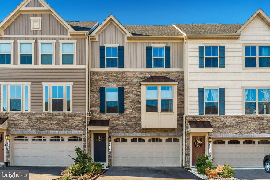 Beautiful Rental In Lake Linganore -Oakdale Area. This beautiful townhome has 3 finished levels and a 2 car garage with car charger. Large open floor plan with well appointed gourmet kitchen oversized island granite countertops, stainless steel appliances, luxury vinyl flooring and easy access to the rear deck. The rear deck is great for entertaining and maintenance free. The upper level has three bedrooms with  two full baths, Large primary bedroom has its own bathroom with separate shower stall. Laundry room  is on upper floor with front loading washer and dryer and a utility sink. Finished  rec room on main level also has a full bathroom great for home office or entertaining. The rear yard has a vinyl fence. Property is available 1-10-25.