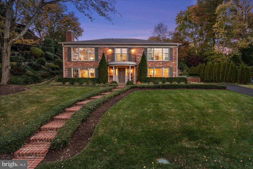 Absolutely stunning all-brick home in the coveted Villamay neighborhood of Alexandria boasting seasonal river views!  Enjoy lush, mature landscaping and  a "perch" bench, perfect for sunrise views and watching fireworks over the Potomac River.  Not a surface is untouched in this meticulously maintained and sophisticated  home. The kitchen, a true chef's delight features quartzite countertops, white shaker style cabinetry, high end Viking appliances, and plenty of storage. A spacious and sunny (east facing) living room offers winter river views, and flows into a large dining room. Family/friends will enjoy time in the bonus sunroom, gathering for a drink, a meal, and conversation. An entertainer's dream, this main level living space offers easy access to host indoors or outdoors on the extensively hardscaped backyard space! Adorned with flagstone finishes and party lighting, the multiple outdoor spaces can accommodate even the largest of gatherings, even a quiet evening near the steps to enjoy the incredible treetop views. This level of the home features an primary suite with tray ceilings, lux lighting,  custom closet space, and an ensuite bathroom with classic marble finishes. Not to be missed, a bedroom was converted into a large dressing room with custom cabinetry, and room for a vanity (easily converted back by moving a door and removing the cabinets). An additional bedroom with a walk-in closet, and hall bathroom with a large tub completes this level. Walk down to the lower level where there is a cozy  wood-burning fireplace (newly relined 2022) and custom built-ins surrounding, making the perfect space for reading or movie night! Enjoy a generously sized bedroom with ample closets and gorgeous marble ensuite bathroom on this level, as well as a bonus room/office for your working needs. On the way to the oversized garage, pass through a lovely mudroom/laundry room boasting plentiful countertop and cabinet space, as well as a beverage fridge and farm sink for entertainment overflow. A truly stunning and one of a kind home, Villamay's unbeatable location is minutes to parks, trails, Old Town shopping and dining, Mount Vernon, DC, Golf Courses, and so much more.  *Tax records show 4 bedrooms. 3rd bedroom upstairs is used as primary "dressing room" currently.