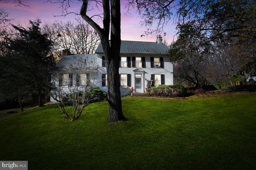 Circa 1740 Single Family with guest home, in-ground swimming pool & a huge barn sitting on 4.5 acres. The kitchen and upper level of the main home were constructed in 1740 and the main living areas were constructed in 1850 making this a charming piece of  history. Your kitchen has an original stone floor, exposed beam ceiling, white cabinets, updated stainless steel appliances, brick fireplace with mantel and wood stove insert. Huge pantry off the kitchen is great for storage. The 1850 part of the home has unique wide plank wood flooring in the hallways and dining room area. Your parlor entrance was updated with new flooring and a half bathroom with an updated vanity.  Home office on the main level with lots of natural lighting. Family room with vaulted ceilings with exposed beams & stone fireplace with mantel. Garden room with lots of windows. Two staircases to the upper level. Owners bedroom suite with private bathroom with custom ceramic tile shower with a glass door. Bedrooms 2-4 are a great size and share a 2nd full bathroom. Guest home with fireplace living room and full bathroom. In ground swimming pool giving a resort feel in the summers. Cozy up by your many fireplaces in the winters. This is a great resort for all seasons. Perfect for an Airbnb. Huge barn for animals or great for a shop. Amazing 4.5 acre wooded lot with lots of open spaces of green grass. The current owner has found many historic items over the grounds. This is truly a piece of history. Great location just 10 minutes off the interstate, close to restaurants, shopping yet has a country feel.
