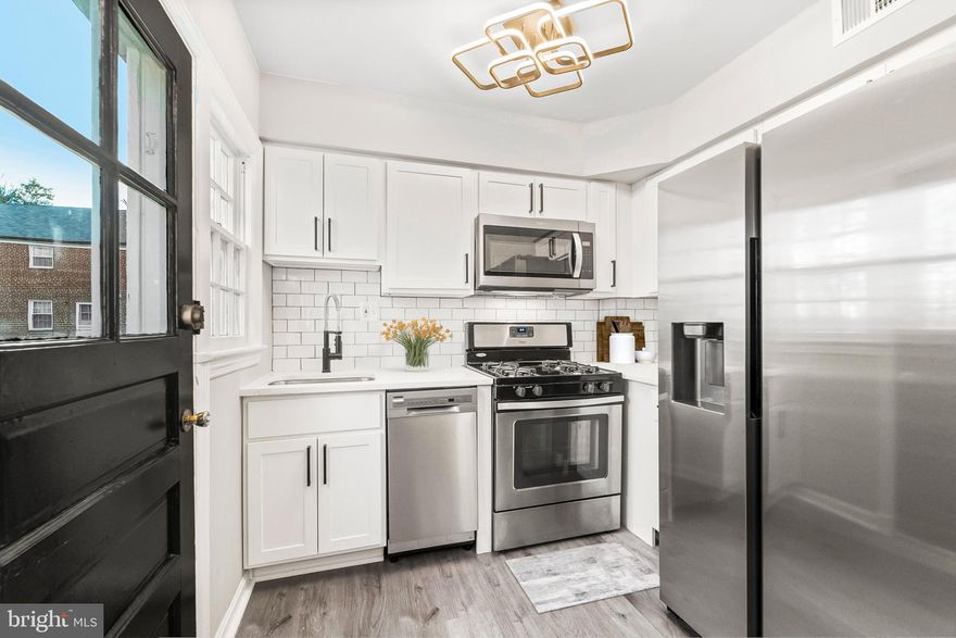 Priced to sell fast! This hot renovated townhouse features a brand new kitchen with new cabinets, quartz countertops and stainless steel appliances, new flooring throughout, updated bathroom with new tile, vanity and more, new lighting, new custom paint, spacious bedrooms and much more! Close to Schools, Shopping, and Commuter Routes.  This Will Not Last!