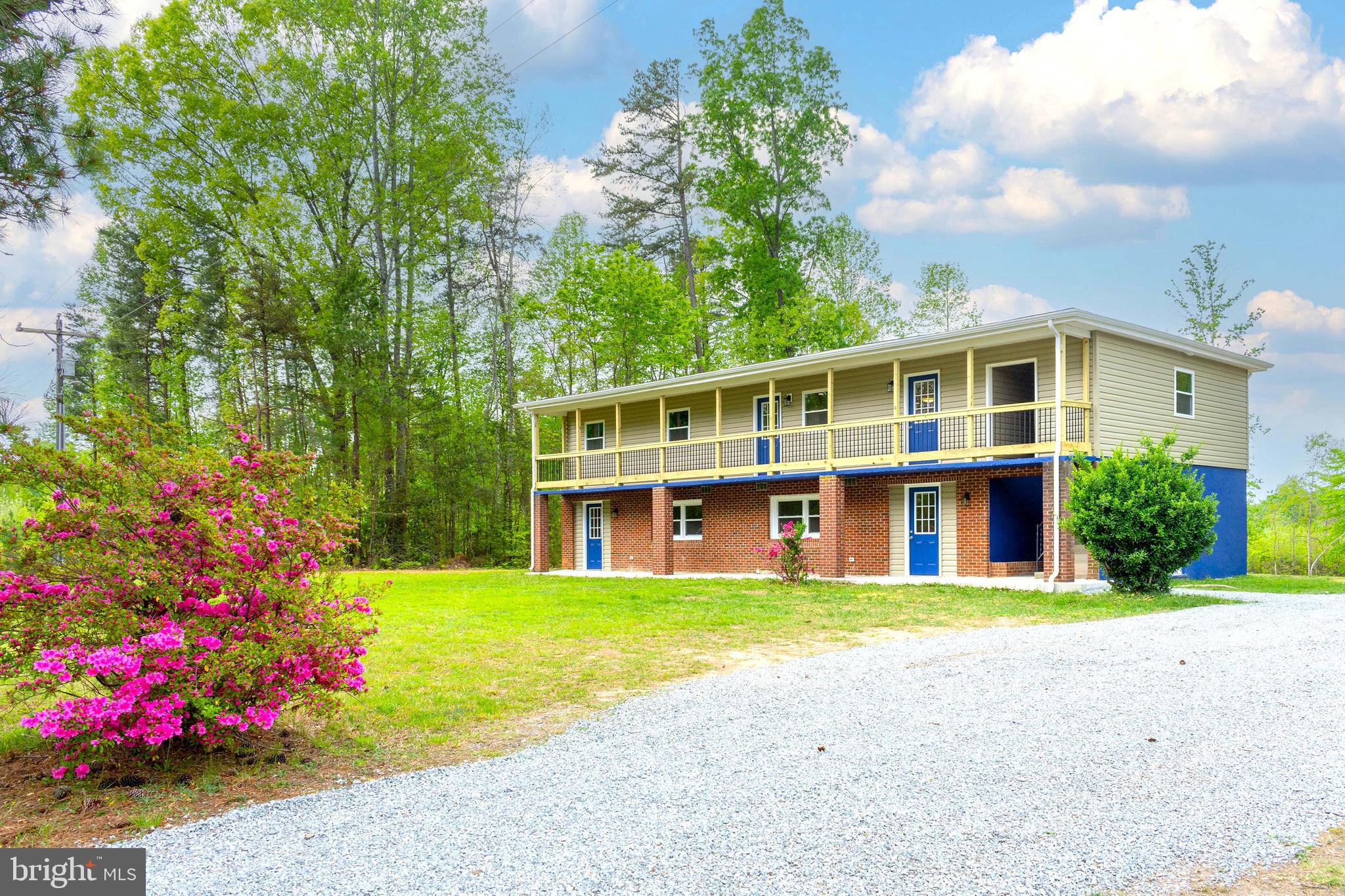 This unique homestead is a perfect investment opportunity for an extended family or rental property investor. Two families can pool their funds and have two separate units for independent living. Owners have fully remodeled the multi-family home, which has a 2 bedroom unit on the main level plus a bonus room and a 3 bedroom unit plus a bonus room on the upper level. Living space is approximately 1,400 sf on upper level and 1,200 sf on lower level. Everything is brand new including stainless steel kitchen appliances, bathrooms, bedroom carpeting, interior flooring, electrical system, plumbing, and 10 person septic. It has been freshly painted and is move in ready!
With today's demand for rental properties, this building is a cash cow! Two rental units available and everything is brand new so there shouldn't be any immediate maintenance needs.
This home is conveniently located near Lake Orange, Lake Anna and the Town of Orange. Seller has put a lot of sweat equity into the renovation and is ready to make a deal! Check this one out today.
