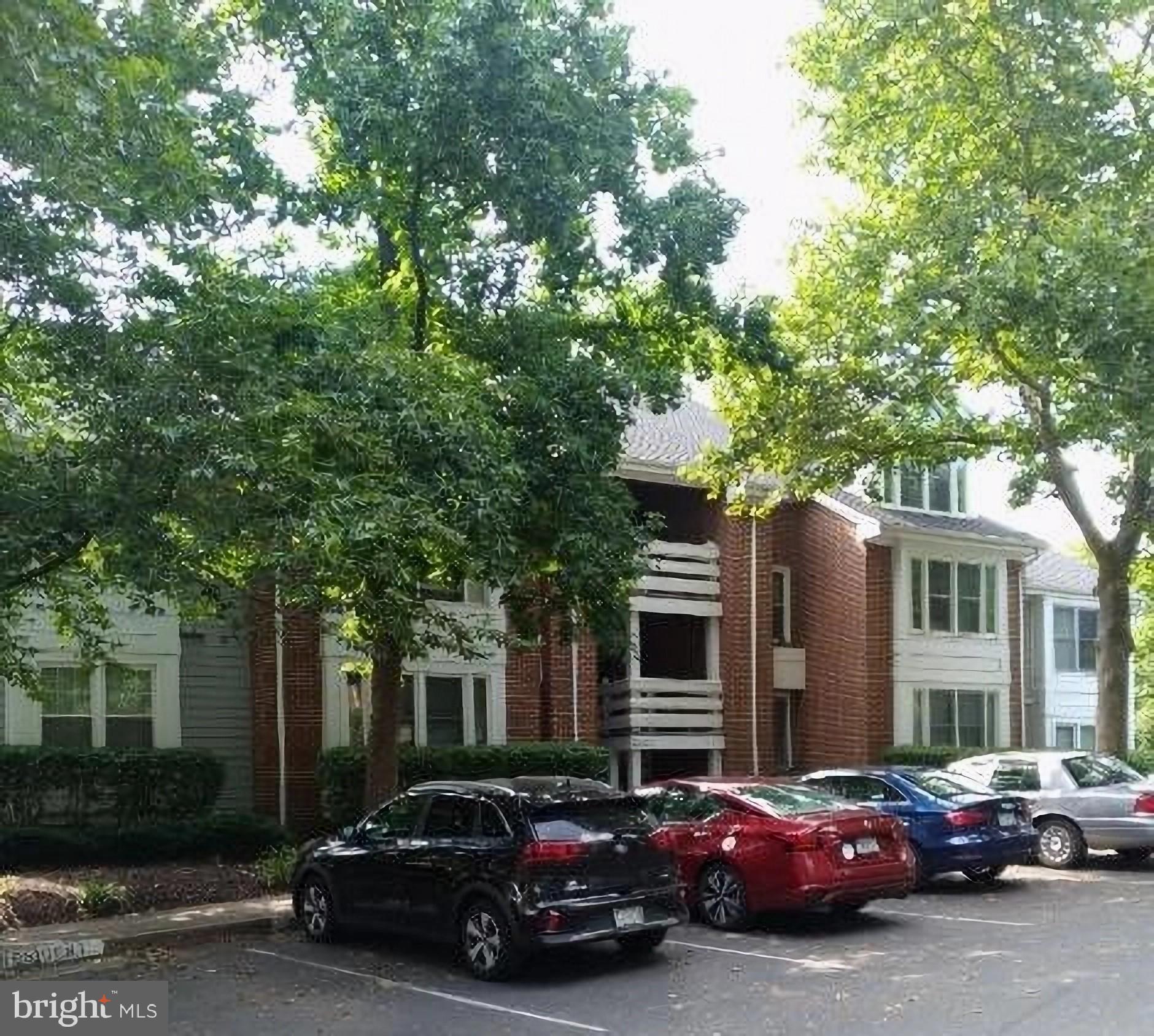 STUNNING LAKESIDE condo is a rare gem to find! Lovely brick home offers a wealth of amenities such as a renovated kitchen and two full bathrooms, fireplace and pool. Open floor plan includes pass-through kitchen window with bar that overlooks the family room. Enjoy the picturesque lake and tree-lined courtyard from the spacious deck and take a stroll on the walking trail. Ground-floor living and nearby parking are an added plus. This contemporary home, in a natural setting, is a pleasant surprise in suburbia. A commuter's dream, it is situated near the Metros, I-495 and I-66, Mosaic Center and bus line. Rare opportunity to rent in this beautiful and quiet community. MUST-SEE!!