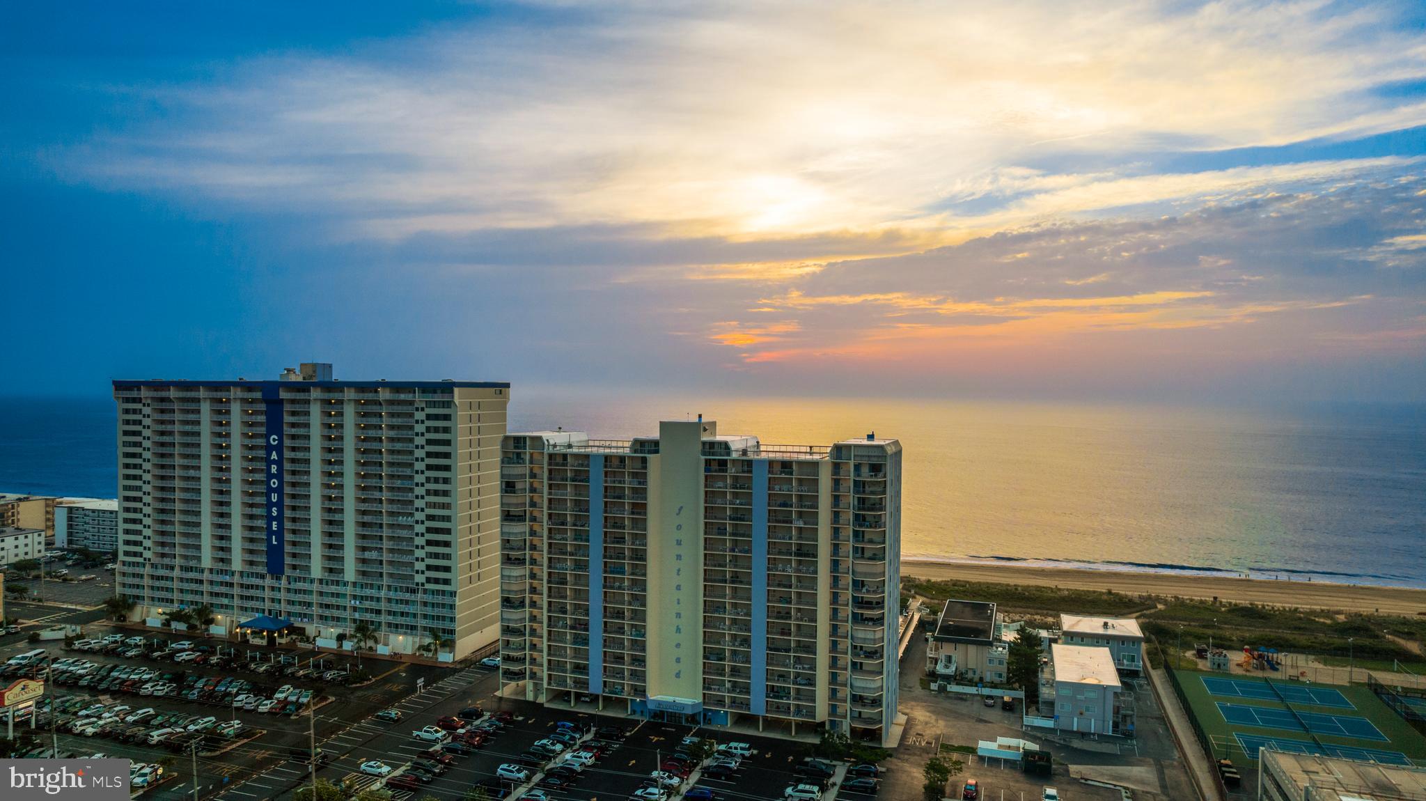 Two story luxury penthouse which can sleep 17-18 family & friends comfortably in this 6 bedroom/4 bath residence! This home boasts a magnificent ocean front balcony. This balcony is one of a kind in Ocean City and is 60 linear feet of direct ocean front goodness. Fear not, at sunset, there are two more balconies for views over the Assawoman Bay. There are 3 ocean front bedrooms and 3 of the bedrooms double as masters. All six bedrooms include oversized sliding glass doors with either ocean or bay front views. This property is presently in a rental program. Listing agent will graciously attend all showings, drone video, floor plan, and rental income all available.
