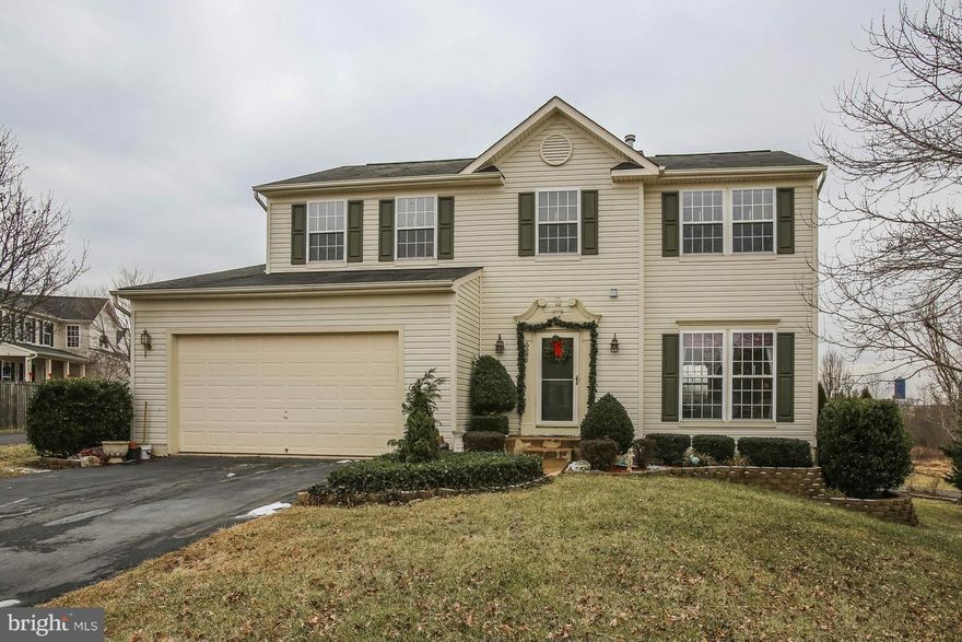 Beautiful home in Cul-de-sac location! Spacious kitchen w/ breakfast room leading to private back deck overlooking common area.  Family Room off kitchen w/gas fireplace for cool evenings.  4 Bedrooms on upper level w/3.5 baths.  The lower level is fully finished currently used as an in-law suite w/full bath, closet and walk-out to patio or it could be used as a Rec Room. Don't miss this one!