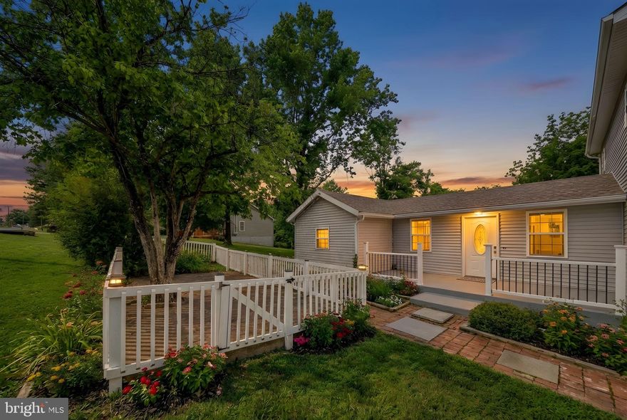 Welcome to this fully renovated, move-in ready home in the Shen Farms Mountain Lake community, offering modern finishes, a functional layout, and access to exceptional outdoor amenities. Situated on a 0.39-acre corner lot, this property provides a peaceful setting with space to relax and enjoy the surrounding natural beauty.

This home has been extensively updated throughout, delivering a true turnkey experience. The renovated kitchen features upgraded cabinetry, modern countertops, stainless steel appliances, and a spacious layout that flows seamlessly into the dining and family room—ideal for both everyday living and entertaining. Recessed lighting and a fireplace enhance the main living space.

The home offers a versatile floor plan, including an entry-level bedroom perfect for guests, a home office, or flex space. Additional features include a formal dining area, breakfast space, luxury vinyl plank flooring, and updated finishes throughout.

Step outside to enjoy the expansive deck and porch overlooking the spacious yard. Residents of Shen Farms Mountain Lake enjoy access to community amenities including basketball courts, picnic areas, a community center, lake privileges, and private access to the Shenandoah River for kayaking, fishing, and outdoor recreation. HOA includes common area maintenance, road maintenance, and snow removal.

This is a rare opportunity to own a fully updated, move-in ready home with modern upgrades in a scenic, amenity-rich community.