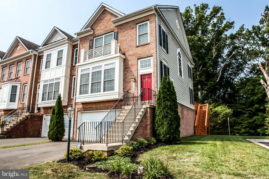 Fabulous brick front 2 car garage Townhome in Forest Park!Great lot w/ deck off Kitchen backing to trees!Perfect for entertaining!Gourmet Kitchen w/ many features, open ML offers hardwood floors, separate DR and more,Stunning M- suite w/ vaulted ceilings and walk-in closet, M- bath w/ a 2 person tub, shower and dual vanities!, near I-95, Quantico, comm.lots, rest s & much more!!. Truly a MUST SEE!