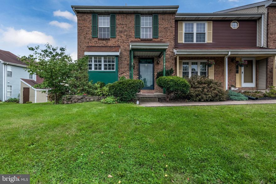 Come see this well maintained and updated end unit two-story townhouse. Combination dining room/kitchen. First floor powder room. Deck off the living rm for entertaining or just relaxing. Three large bedrooms upstairs. Partially finished lower level adds even more living space to this great townhouse. New Carpet just installed! Close to everything including the schools. Call me for you private showing.