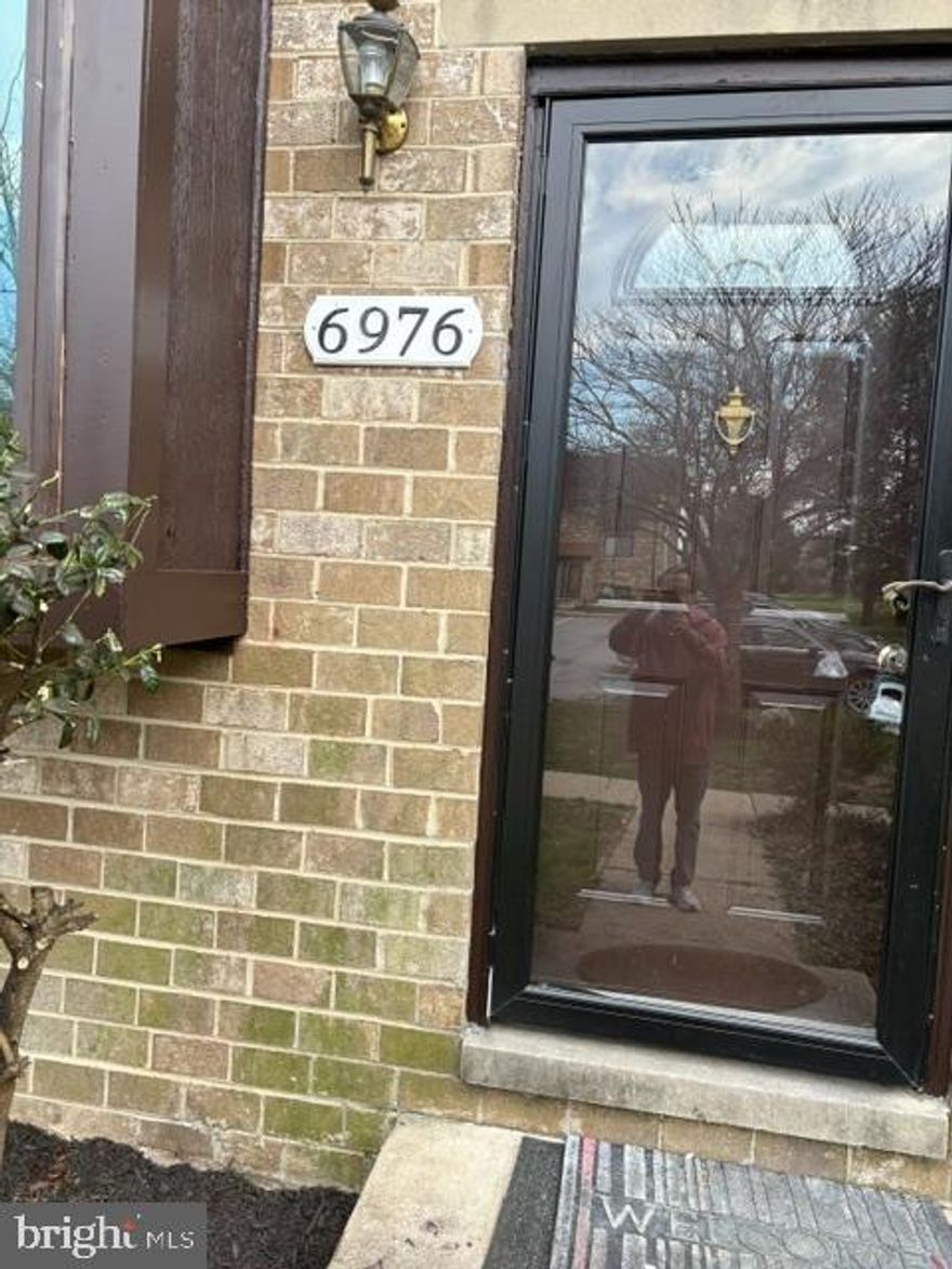 Welcome to 6976 Knighthood Lane. This property rests inside one of the first communities in Columbia, the Village of Owen Brown. This all brick town home has 3 bedrooms upstairs, one full and one half on the upper level. On the main level there is a breakfast room, living and dining room, kitchen and one half bath. The basement is completely finished with family room, walk out sliding glass door, wet bar a full bath, storage room with washer and dryer along with ample storage space. There is stone covered patio with enclosed yard in the back. The property has new flooring, recently painted and has lead free certificate. The roof will be replaced on 4/13/26 and the stove and the refrigerator will be replaced. Priced to sell.