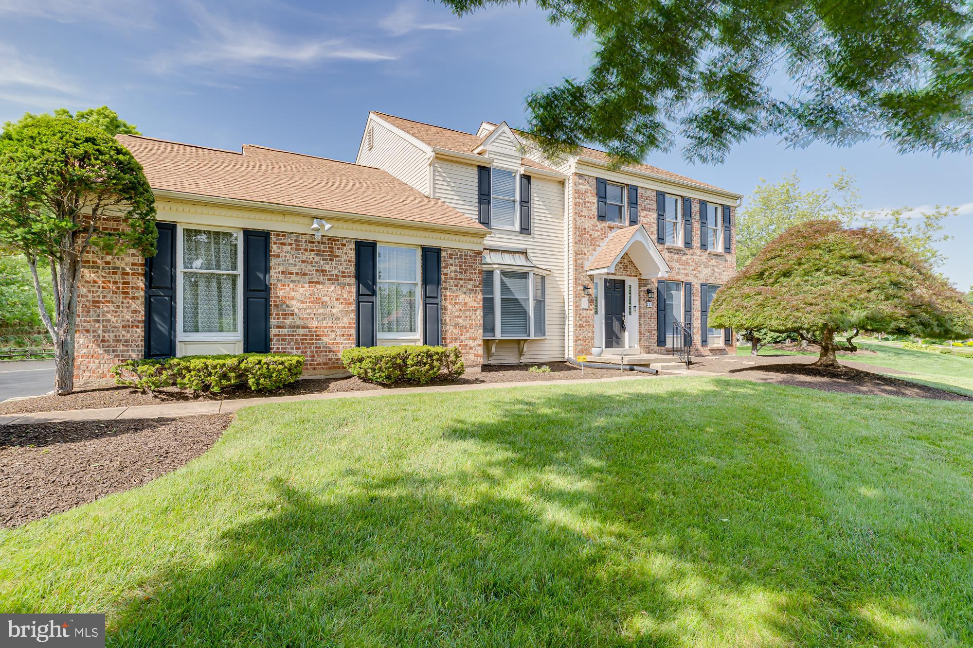 Welcome to 233 Westwind Way, a stunning two-story Colonial nestled on a quiet street in the desirable Dublin Hunt II development, within the award-winning Upper Dublin School District—a National Blue Ribbon School of Excellence. From the moment you arrive, the home's impeccable curb appeal draws you in with its classic brick exterior, manicured lawn, and mature landscaping. Pull into the 2-car attached garage and step inside through the front door and you’re greeted by gleaming hardwood floors. To the right, the formal living room offers an elegant setting with crown molding and chair rail accents. On the left, the formal dining room mirrors the same sophisticated design, enhanced by a beautiful large bay window that bathes the space in natural light making it perfect for hosting dinners and holiday gatherings. Connected seamlessly to the dining area is the heart of the home: a spacious, eat-in kitchen outfitted with granite countertops, a coordinating tile backsplash, classic wood cabinetry, a gas self-cleaning range, stainless steel appliances, and a large center island offering additional prep space and storage. A dedicated pantry and luxury vinyl flooring complete the space. Just beyond is a step-down breakfast area featuring a vaulted ceiling with a skylight and a sliding glass door that leads to the private backyard. Adjacent to the kitchen is the warm and inviting family room, complete with hardwood floors, recessed lighting, a wood-burning fireplace flanked by built-in bookshelves, and crown molding— perfect for cozy evenings or casual gatherings. A powder room is conveniently located between the kitchen and family room, while a large laundry/mudroom off the driveway entry provides the ideal drop zone for busy days. Upstairs, hardwood floors continue throughout the second level, where you’ll find four generously sized bedrooms and two full bathrooms. The expansive primary suite is a true retreat, featuring two custom walk-in closets, a sitting area, and a beautifully updated ensuite bath with heated tile floors, a dual-sink vanity, and a sleek stall shower with a rainfall showerhead. The remaining three bedrooms all include ample closet space and sun-filled windows, sharing a well-appointed hall bathroom with a double vanity, tiled floors, and a tiled tub-shower combo. The finished basement adds an additional 1,000 square feet of flexible living space. Ideal for a home gym, second family room, playroom, or office, while still offering plenty of room for storage. Step outside to your beautifully landscaped, fully fenced backyard, where a picturesque setting awaits. Enjoy summer barbecues and outdoor entertaining on the expansive patio, surrounded by lush greenery and a well-maintained lawn that offers both privacy and tranquility. Ideally located just minutes from shopping, restaurants, regional rail stations, and the PA Turnpike, 233 Westwind Way offers the perfect combination of comfort, convenience, and elegance. Come home to timeless charm and modern amenities.
