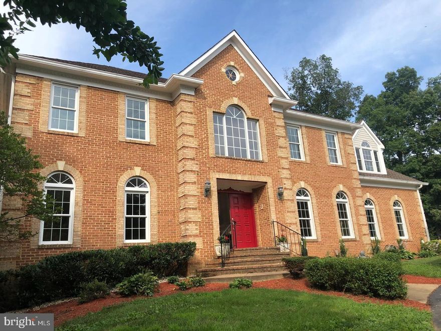 BACK ON THE MARKET! WHY NOT GATHER FOR THANKSGIVING IN THIS BEAUTIFUL AND SPACIOUS 5000+ SQFT HOME W/ 5BR AND 4.5 BA ON 1.4+ ACRES IS ISO A QUALIFIED AND CARING TENANT. It sits on a 1.46 acre manicured corner lot with 2 gates and a circular drive. This 2 story; 5BR/ 4.5BA Brick (on 3 sides) Colonial has a two-story custom painted foyer w/ chandelier and marble floors, a curved grand staircase and lovely arched doorways throughout. There's a library, a familyroom with fireplace off of the gourmet kitchen with breakfast area; stainless steel appliances, and refinished original hardwoods on the main level. There's also a spaceous deck and screened-in porch. The Upper level has 4 BR and 3 full BA . The primary and it's adjacent BR each have ensuite BA. There is an oversized BR above the garage w/sink that could be used as a second flr family room/ office space/ prayer room or exercise area. The lower lever has a 5th BR with bay windows, a full bath with double entry, a family room with another stone fireplace, and a wet bar including a sink, counter & cabinets and a third refrigerator w/freezer. There's also a large open space that could be used for exercise/ an office space/ a playroom/ game room or whatever you like. There's plenty of storage and shelving and a walkout to an oversized fenced-in back yard. It's located minutes from FXCo Pkwy @ Braddock Rd.; Rt. 28; Centreville; Fairfax; George Mason University and Fairfax County Government, as well as, shopping & dining, yet completely private and peaceful. Landscaping & lawn mowing are included. Tenants onoly pay for Fall leaf removal & Spring cleanup. Rent for multi-year lease is negotiable.