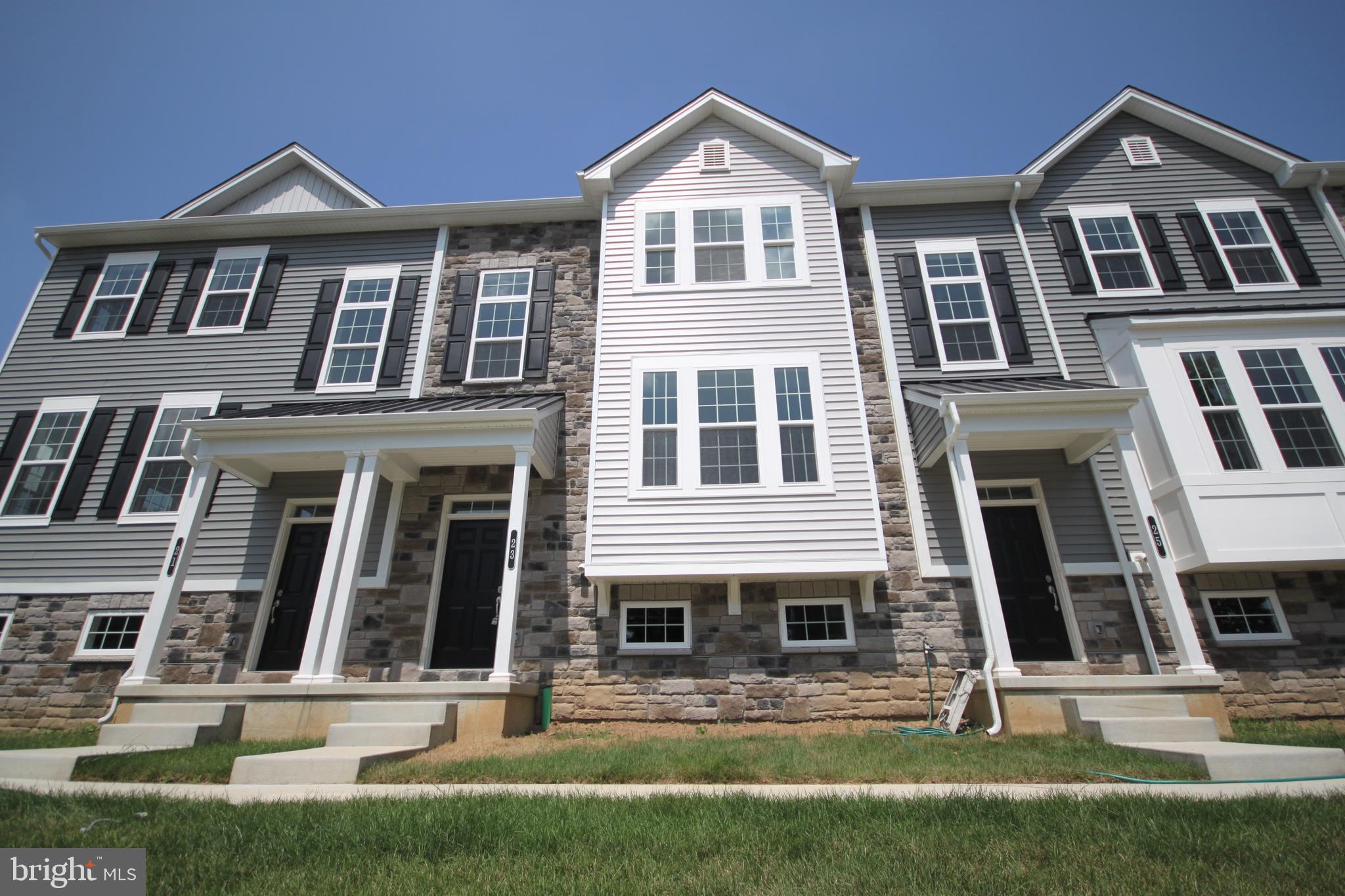 New luxury Townhomes located in award winning Central Bucks School District in downtown Chalfont Borough. These homes comes with lots of upgrades: 3 Bedrooms, 2 Full Bathrooms, 2 Partial Bathrooms, 2 car rear entry garage with auto opener, natural Gas Heat, 9' ceiling height on main level, luxury wood look vinyl plank flooring, Gourmet center island kitchen with granite countertops, 42" cabinets and full pantry, 18' x 10' maintenance -free composite rear deck off Breakfast Room, Owners Suite with spacious walk in closet and private bathroom with 5' walk in shower, double vanity and linen closet. Laundry Room conveniently located on the upper floor, 2 additional bedrooms and hall bathroom. Wonderful downtown location, adjacent to the Chestnut Street Park that features walking trails, ball fields, nature areas with wildflowers, birds and wildlife and 2 blocks from the Chalfont Train Station. Owner pay HOA.