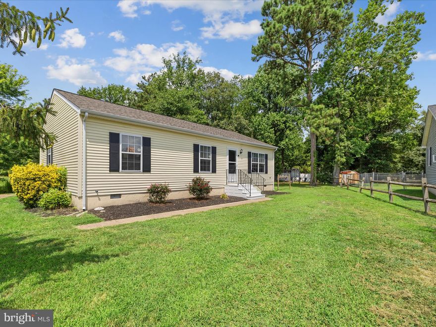 If you've been wanting to buy instead of rent--this house is a must-see! 3 bedrooms and 2 full baths, located at the end of a cul-de-sac, large corner lot measuring .39 acres, and backing to open farmland provides great "elbow room"! And, a map search on USDA's website reveals this house is located in a USDA 100% loan/no downpayment loan eligible zone! Also located within Willards town limits so there's public water and sewer. The house has undergone many important upgrades just this year: new architectural shingle roof, new hot water heater, a kitchen renovation, new LVP flooring in kitchen, hallway and both bathrooms, new sink vanities in both bathrooms, and new comfort height toilets in both bathrooms! And, the HVAC unit was replaced in '23. The kitchen renovation included all new white cabinets with soft close doors and drawers, an added pantry cabinet, new countertops, tile backsplash and new microwave. The refrigerator was new in '24 and the stove in '21.  The hallway full bath offers a tub shower and linen closet. The primary bath offers a walk in shower. Laundry closet with full size washer and dryer. This house is charming with plenty of parking in the driveway, a back deck and a large side yard with shed.