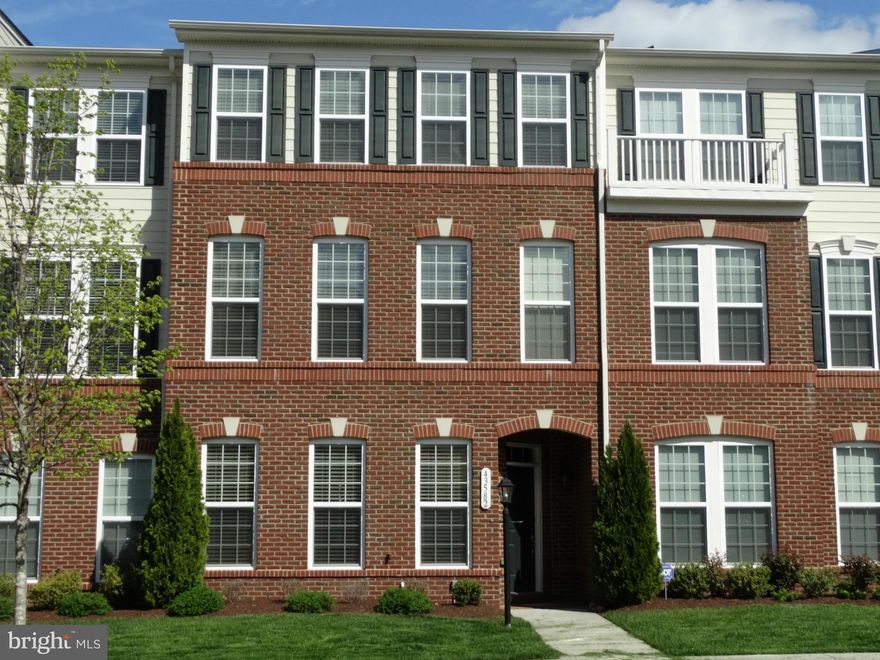 Stunning townhouse in Lansdowne Town Center.Boasting over 3600sqft this home shows better than a model!UPGRADES GALORE! 4 bed/3.5 bath/3-car tandem style garage with private driveway.Chef's kitchen with granite,stainless and counter depth frig!Enormous owners suite with sitting room, dual walk in closets and spa bath!Huge rear deck! HOA includes Internet/Cable/Yard Maint/Amenities. Walk to shops!