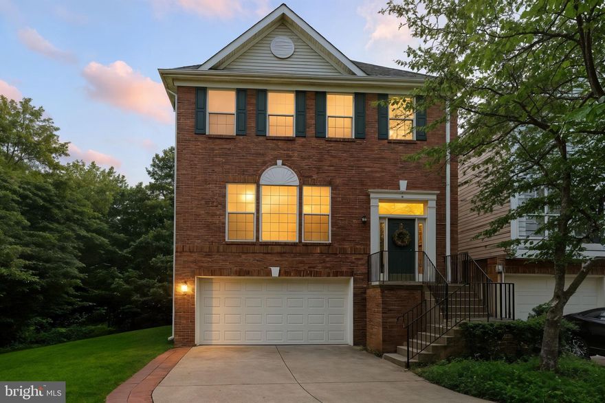 Multiple offers received — please submit your highest and best by Tuesday, July 22nd at 7 PM.

* 5.3%-5.7% available for qualified buyer (NOT assumable),  17.5k(First time home buyer), -20k(community partners) grant also available. 

Discover one of the largest and most desirable floor plans in Centreville, set on a premium lot with a peaceful wooded backdrop. This expansive brick-front townhome offers the perfect blend of space, layout, and location.

The main level features hardwood floors, tall ceilings, elegant architectural columns, and sun-drenched living and dining areas. The open-concept kitchen is equipped with granite countertops, stainless steel appliances, and a large center island—flowing seamlessly into the bright morning room and extended family room with a cozy gas fireplace, ideal for everyday living and entertaining.

Upstairs, enjoy brand new carpet, and oversized bedrooms, including a spacious primary suite with walk-in closet, updated lighting, and private bath. A full-size laundry room on the bedroom level adds everyday convenience.

The fully finished walk-out basement features new carpet, a large recreation area with a second gas fireplace, and sliding glass doors to the backyard. The space is flexible and can easily accommodate a future 4th bedroom—perfect for guests, a home office, or multi-generational living.

With fresh updates, a flexible floor plan, and a tranquil setting near shopping, dining, and major commuter routes, this home delivers exceptional value and comfort in a sought-after location.