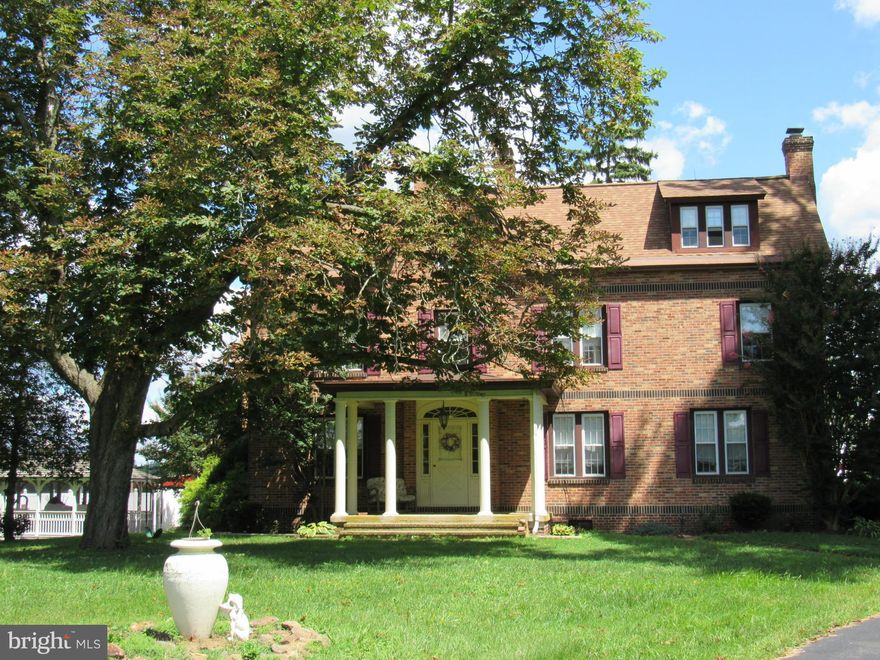 This lovely 1890 historic home sits on 14.76 acres and includes the main house with an attached apartment, basement (with wine cellar) and a detached 3 car garage.  Additionally there is an enclosed sand riding arena, workshop with 2 bedroom apartment, 12 stall horse barn, shed row barn, construction shop, 3br mobile home, 4 fenced fields for animals and a shop/office/storage bldg.