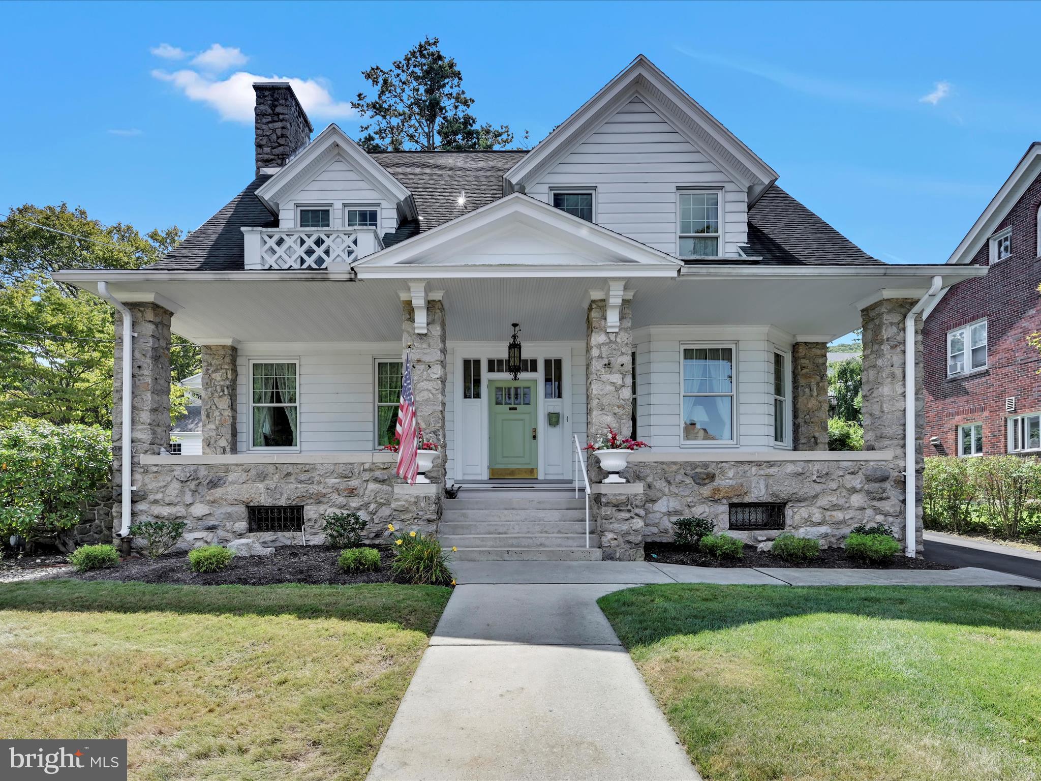Welcome to one of Mahantongo Street’s mansions — a grand, preserved, historic home offering a century of elegance, charm, and refined living. Nestled in the heart of Pottsville’s historic district on over 1/2 acre, this home blends original craftsmanship with tasteful modern updates. Step inside the welcoming foyer, with soaring ceilings, and hardwood floors that whisper stories of the past. Enjoy entertaining in the expansive living room and formal dining room. The kitchen has been updated with granite counters and a charming banquette table for casual dining, and is also home to the laundry area for your convenience. Also on the first floor is an office with access to the sunroom and a lovely powder room tucked under the stairs. Ascend the grand staircase to an open landing on the second floor, which boasts four spacious, well-lit bedrooms, each with cedar closets with automatic lights. There are two full bathrooms on this floor, one in the hall and one in the primary bedroom. The 3rd floor offers a 5th bedroom as well as a full bath with shower stall and plenty of additional storage space. The partially finished basement is home to a built-in bar and round bench seating as well as the home's mechanicals including a furnace which can be run on natural gas or oil. Outside, you'll find an oasis of open yard space, a screened sunroom porch, a covered patio, gazebo and two 2-car detached garages. Whether you're a lover of history, architecture, or simply seeking a one-of-a-kind residence in a prime location, this Mahantongo Street mansion invites you to become part of its enduring legacy.