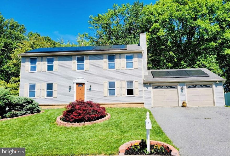 Updated  and very spacious  4 Bedroom 2.5 Baths, 2 Car Garage- in a desirable culdesac block of Hunters Woods.  Freshly painted, new flooring, recessed lights,  new stainless steel appliances, granite countertops,  Solar Panels  and more.  Laundry Room on main level which leads to garage. Huge lot with scenic private view which backs to woods.   Walk out basement to patio and leads to a small  trail to  Hunters Woods Local Park.   Such a spacious back yard with so many possibilities to design to your own taste.  * Jacquie's Title Group in Rockville preferred *