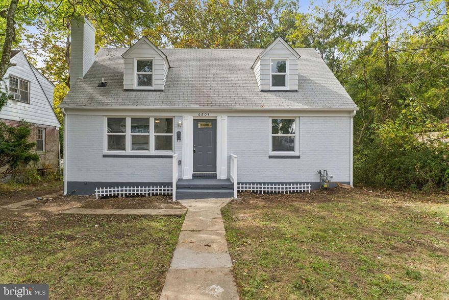 This beautiful and spacious Cape Cod, featuring 5 bedrooms and 3.5 baths, is now available in the desirable Campfield area! You’ll love everything this home has to offer — including a main-level primary suite, tray ceilings throughout, an open floor plan, abundant natural light, and a neutral color palette accented by modern updates. The inviting main level features a living room, dining area, and kitchen that flow seamlessly together, making it perfect for entertaining. Enjoy cooking in the updated kitchen with stainless steel appliances, granite countertops, crown molding, chair rail, and hardwood floors. A wood-burning fireplace adds warmth and charm to the main living space. Step outside to a large covered rear porch overlooking a spacious yard—ideal for gatherings, outdoor dining, or even adding a he-shed or she-shed while still leaving plenty of room to host family and friends for holidays and celebrations. The fully finished lower level offers two additional bedrooms, a full bath, and a family room with a separate rear entrance, providing a perfect setup for guests or extended family. Upstairs, you’ll find two generous bedrooms and another full bathroom featuring a stand-up shower. Situated on a corner lot, this property includes both a side yard and a large rear yard. The street has also been prepped for a future driveway, adding even more convenience. Don’t miss your opportunity to make this stunning Catonsville home yours!