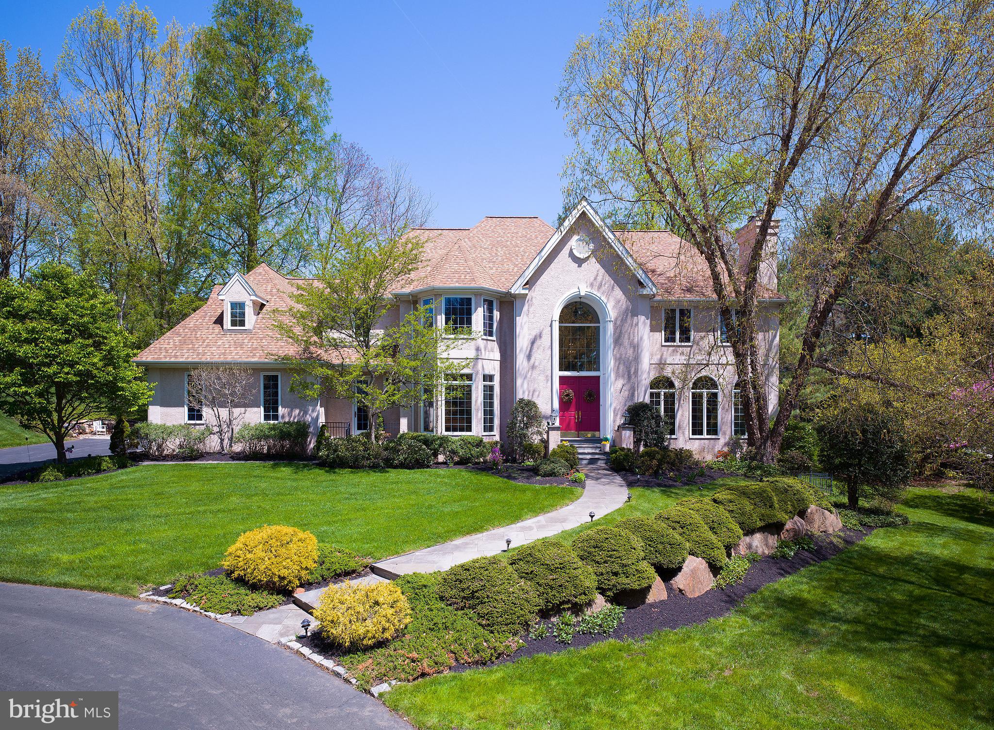 Gracious living is ready and waiting for your familys enjoyment in this expansive 6 bedroom, 4.3 bathroom colonial. 2 Aronwold Lane meets all your needs and then some, with 6,200+ sq ft of inviting interiors, generous grounds spanning 2.64 acres, an outdoor deck and patios, and exclusive location in an HOA community of only 4 stately residences! The 1997-built charmer complete with a new 2019 roof offers 3 stories of comfortable, versatile living quarters plus a large finished walkout lower level. Whether your desire is to entertain guests, celebrate holidays, relax with the family, work remotely, or escape for some alone time, there is truly a place for everyone. The elegant home presents timeless features like a double-height center hall, open archways, beautiful hardwood floors, airy ceilings, tasteful moldings and built-ins, and 3 fireplaces. Oversized and arched windows along with skylights and glass French doors fill the ambience with an abundance of natural light. A formal living room, lovely dining room, and spacious kitchen with skylights, a big granite island, sunny breakfast area and desk station afford functionality and flow. The highlight of the house is the fabulous sky-lit family room with a soaring vaulted ceiling, floor-to-ceiling stone fireplace, and nearby wet bar with wine chiller for serving cocktails with ease. Step outside through sets of sliding doors to the wonderful deck for alfresco dining and summer gatherings, with a backdrop of picturesque views. A handsome office with wall of built-in bookshelves provides a peaceful ambience for reading and conducting business. Also on this level is a laundry room, 2 powder rooms, and access to the 3-car attached garage. A dramatic curved staircase takes you up to the comfortable sleeping quarters with 5 bedrooms and 3 full baths for family and guests. The primary bedroom is enormous for mom and dad, with a striking tray ceiling, lots of room for a sitting area, and a gas fireplace to cozy around. Also en-suite is a walk-in closet and full bath with double vanities, shower, and soothing sunken tub. Two sets of additional bedrooms share Jack and Jill baths. Front and rear stairs rise to the 3rd floor as well, where you will find a sky-lit sitting area, multipurpose/media room, 6th bedroom, walk-in closet and full bath. The fun continues on the walk-out lower level with a game room, den, powder room and plenty of storage. Central air, a security system, and great location in the Marple Newtown School District make this one a keeper.