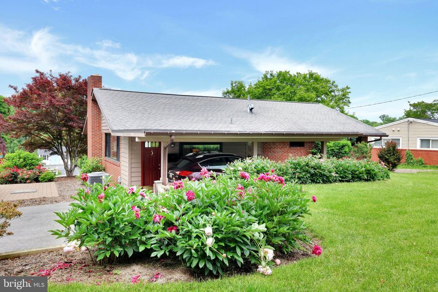 MOTIVATED SELLER - pictures coming soon.   Location, Location, Location! Charming 4-Bedroom, 3-Bathroom Rambler in the desirable Stonewood community in Towson, MD.  Pictures don't do this mid century home justice, so schedule a tour and come see for yourself.

You won't see many homes that have been this meticulously maintained and improved. The main floor's light-filled living space flows into the updated kitchen and dining area.  Down the hall are three bedrooms and two bathrooms, including a primary bedroom with ensuite bath that features custom lighting, marble, and shower door.  A stylish staircase off the kitchen leads down to the newly finished basement (2019), where no detail has been overlooked.  The ultimate space for entertainment and relaxation, the basement boasts tech upgrades galore, with the media wall wired for ethernet, HDMI, power conditioner, and optical audio.  Storage abounds, from the laundry area to the wet bar to the fourth bedroom and bath with steam shower.  The home's exterior spaces are full of thoughtfully designed and mature landscaping, and the carport and brick patio were both resurfaced in 2020.  Unlike many homes on Stevenson, the 3-car carport and driveway are off the main road, on Kimway.  No need to exit your home directly onto Stevenson!

711 Stevenson gives you the best of both worlds - a tranquil residential setting with easy access to the vibrant heart of downtown Towson. You’ll be just minutes away from excellent shopping, dining, and entertainment options, as well as the area's top-rated schools. Stoneleigh Elementary, Dumbarton Middle, and Towson High are all within a short walk or drive.  You are also a short drive from Carver Center for Arts and Technology High School.  With easy access to major highways and public transportation, this home offers easy commutes to Baltimore and surrounding areas, making it ideal for professionals and families alike.  Non-resident access to the Stoneleigh pool is available.