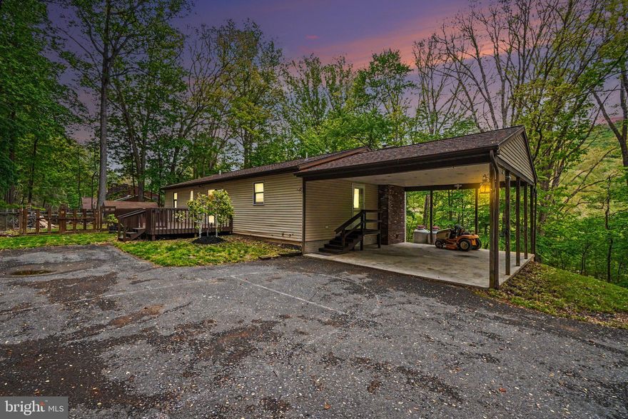 Tucked away in the heart of Stony Creek, 2656 Ellendale Road offers the perfect blend of privacy, nature, and outdoor adventure. This 3-bedroom, 2-bath ranch home sits on a private road and backs directly to State Game Lands, ensuring no one will ever build behind you and giving you direct access to the beauty and recreation this area is known for.

Perfect for an outdoorsman, weekend getaway, hunting cabin, or full-time residence, this property is just a short distance from fishing, hiking, and the Appalachian Trail. Inside, the home features comfortable living spaces, a country kitchen, first-floor laundry, fireplace, and central air for year-round comfort.

Recent updates include a new roof and a freshly stained deck, creating an inviting outdoor space to relax, entertain, or simply take in the peaceful surroundings. The nearly one-acre lot, large deck, and 2-car carport add even more functionality and charm to this unique property.

If you’ve been searching for a private retreat with direct access to nature while still being within reach of local conveniences, 2656 Ellendale Road is ready for its next chapter.