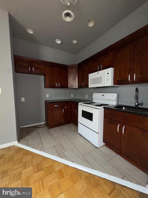 Welcome to 4254 Parkside Ave - 3rd Floor Rear Apartment. This bright and spacious 2-bedroom, 1-bath unit is move-in ready and perfect for comfortable city living. Featuring high ceilings, recessed lighting, and an open-concept living room and kitchen, the layout feels airy and inviting. A long hallway leads to two generously sized bedrooms and a full bath, easily accommodating 3–4 people. Located on the third floor, this unit offers both convenience and charm. Enjoy wood flooring in the living and kitchen areas, cozy carpeting in the bedrooms, and plenty of natural light throughout. The building sits directly across from a park and just one block from Girard Avenue, giving you quick access to downtown Philadelphia, local shopping, and great outdoor amenities.