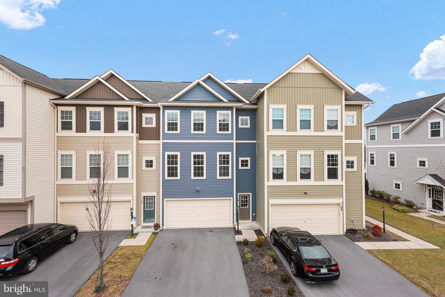 Phenomenal location for this amazing townhome with a private backyard. This 2-car garage townhouse offers nearly 2,700 sq.ft. and 3 bedrooms + 3.5 bathrooms.  Upgrades include Quartz countertops, stainless steel appliances, pendant lights above island, a separate office/den, a luxury owner's bath, two huge walk-in closets, large bedrooms, water softener, and more. Enjoy the large deck with a private view of open land.  Free access to community amenities including the swimming pool, tennis courts, tot lot, picnic pavilion, walking trails, and more! Owner/Agent. This is one of the best townhome locations in the community. Don't miss it!