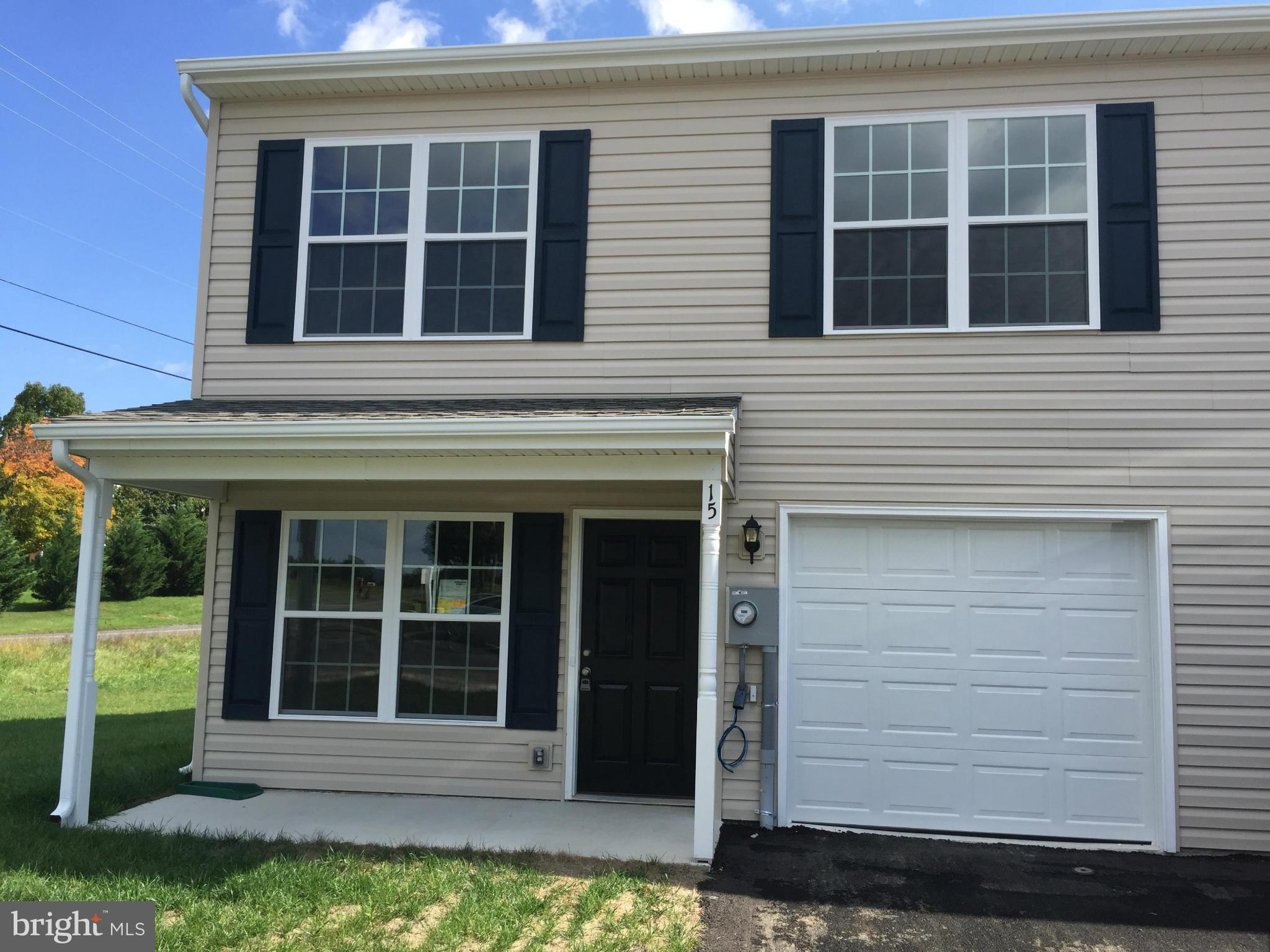 Immediate delivery - spacious end unit 22 foot wide garage TH w/close to 1850 sq.ft. on 2 levels. 3BR/2.5BA bath, 1 car garage, Moen faucets, GE appliances, vinyl windows, new construction. Very clean fit and finish - this is a nicely built property. Photos may show combinations of both floorplans as well as kitchen color Please use Matrix showingtime for showing instructions - on combination box.